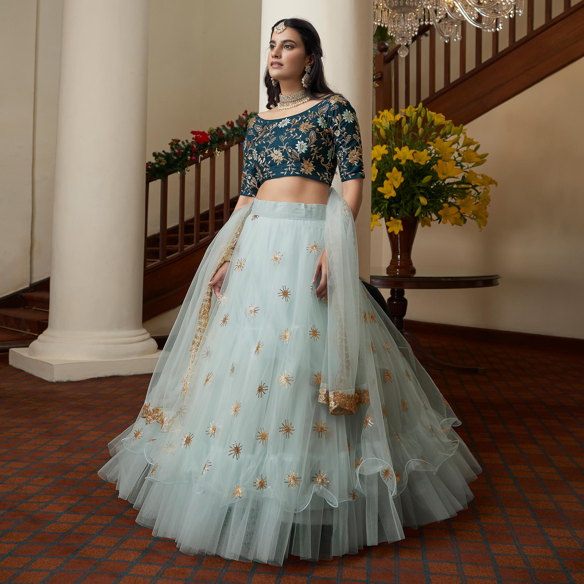 Sky Blue Sequins Embroidered Netted Lehenga Choli