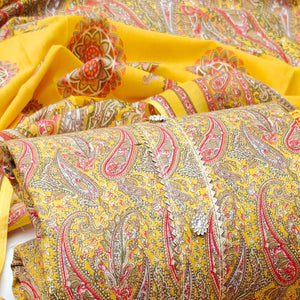Yellow Printed Cotton Blend Dress Material