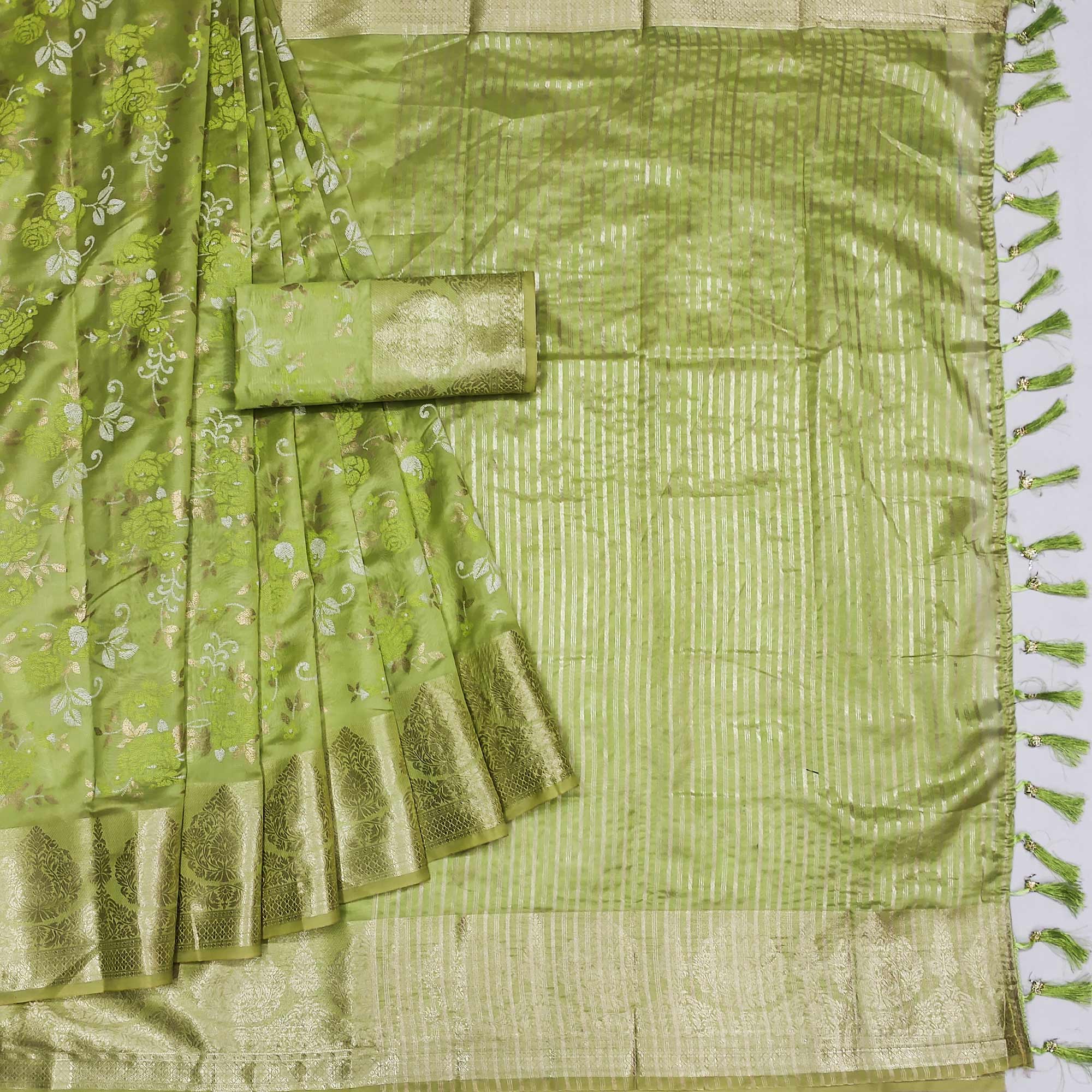 Green Woven Organza Saree With Tassels