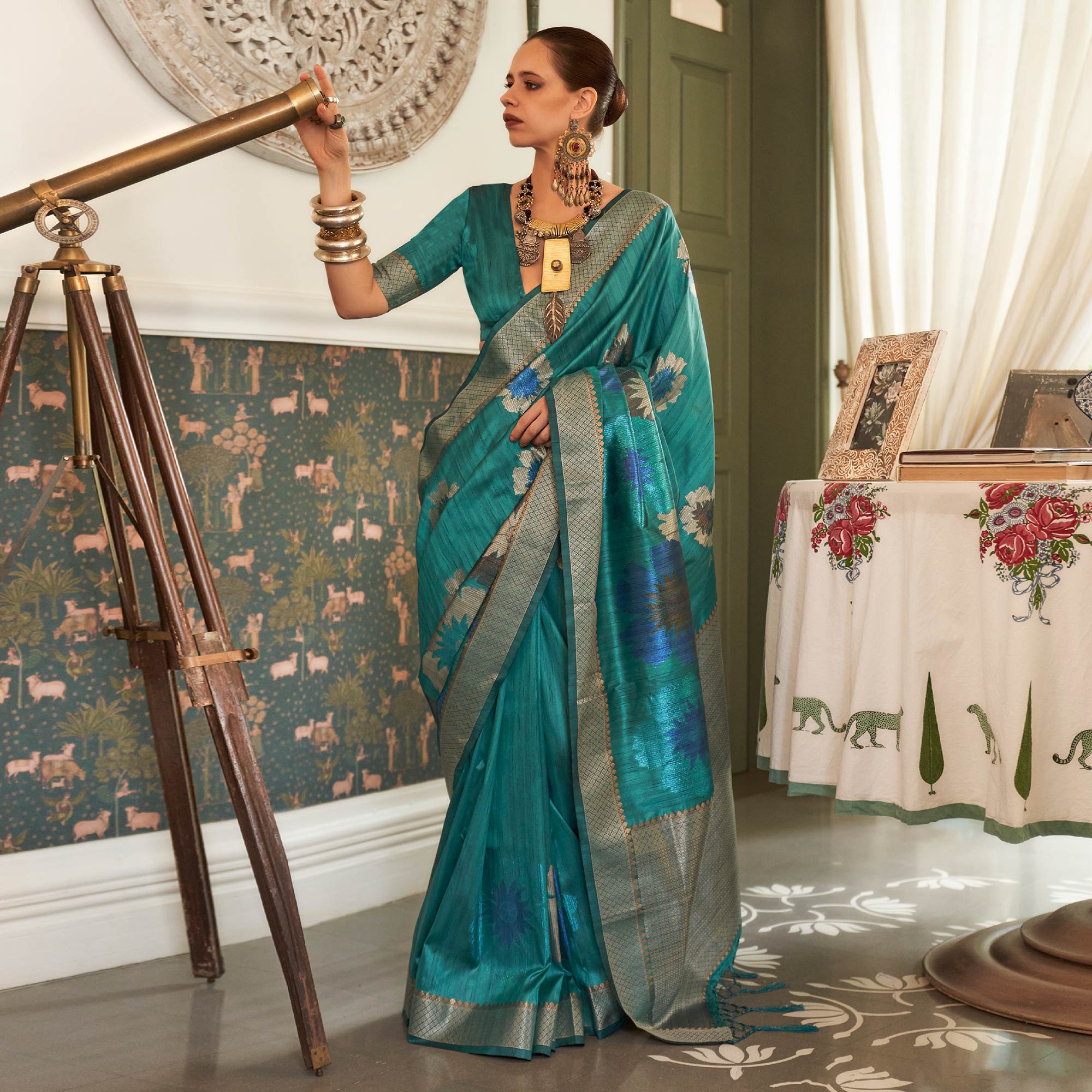 Turquoise Woven Art Silk Saree With Tassels