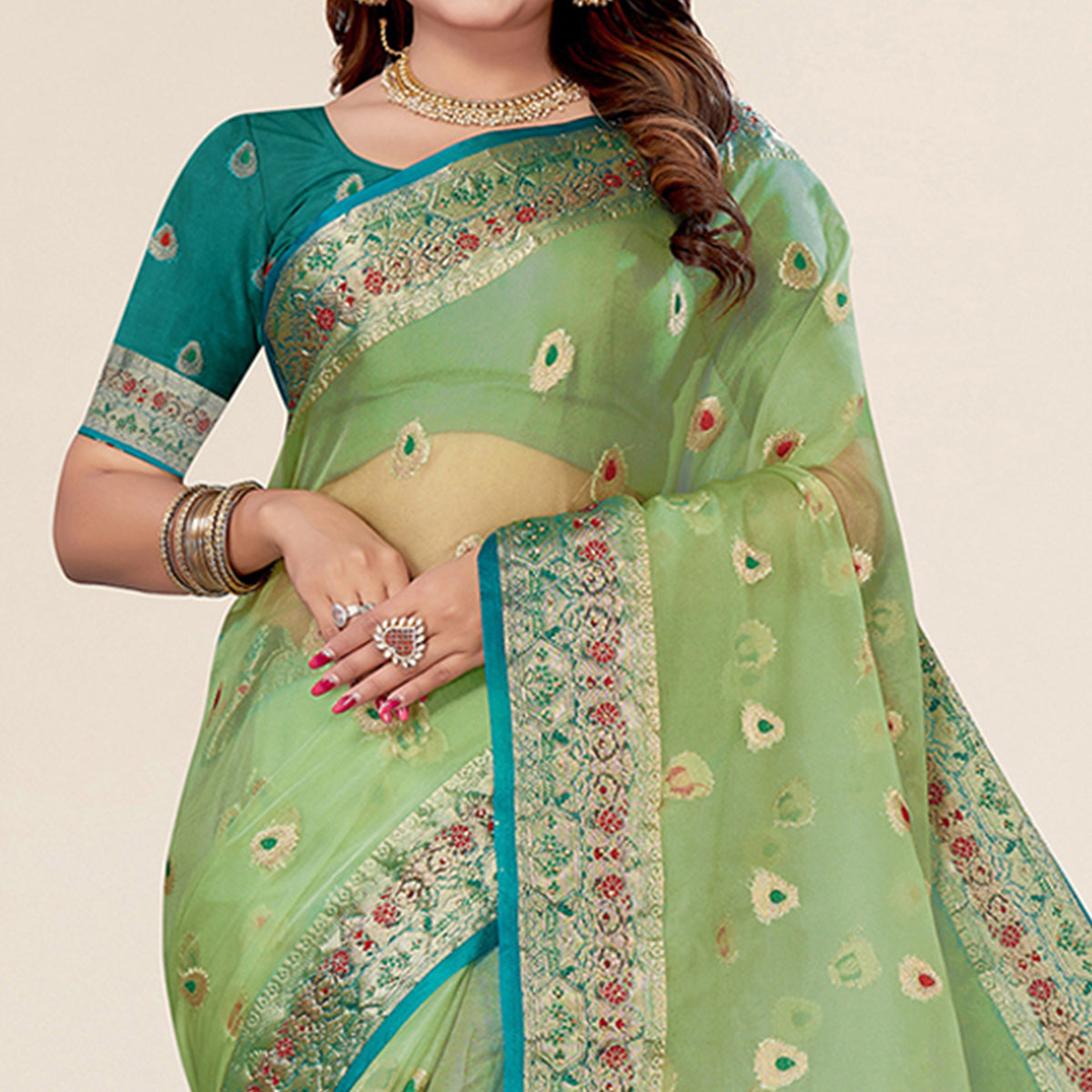 Pista Green Woven Organza Saree With Tassels