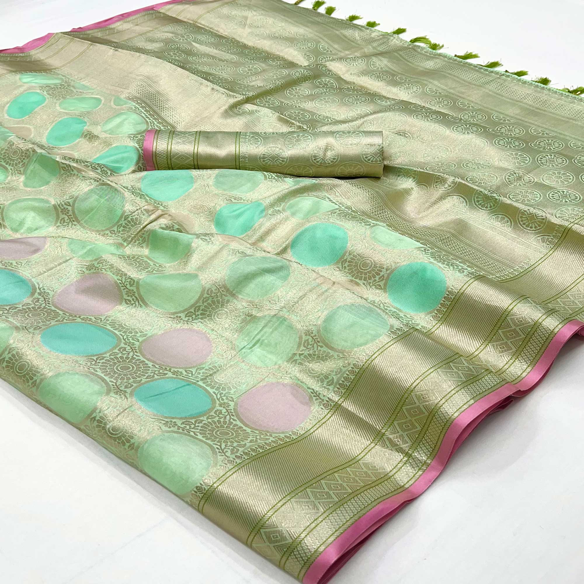 Green Floral Woven Organza Saree With Tassels