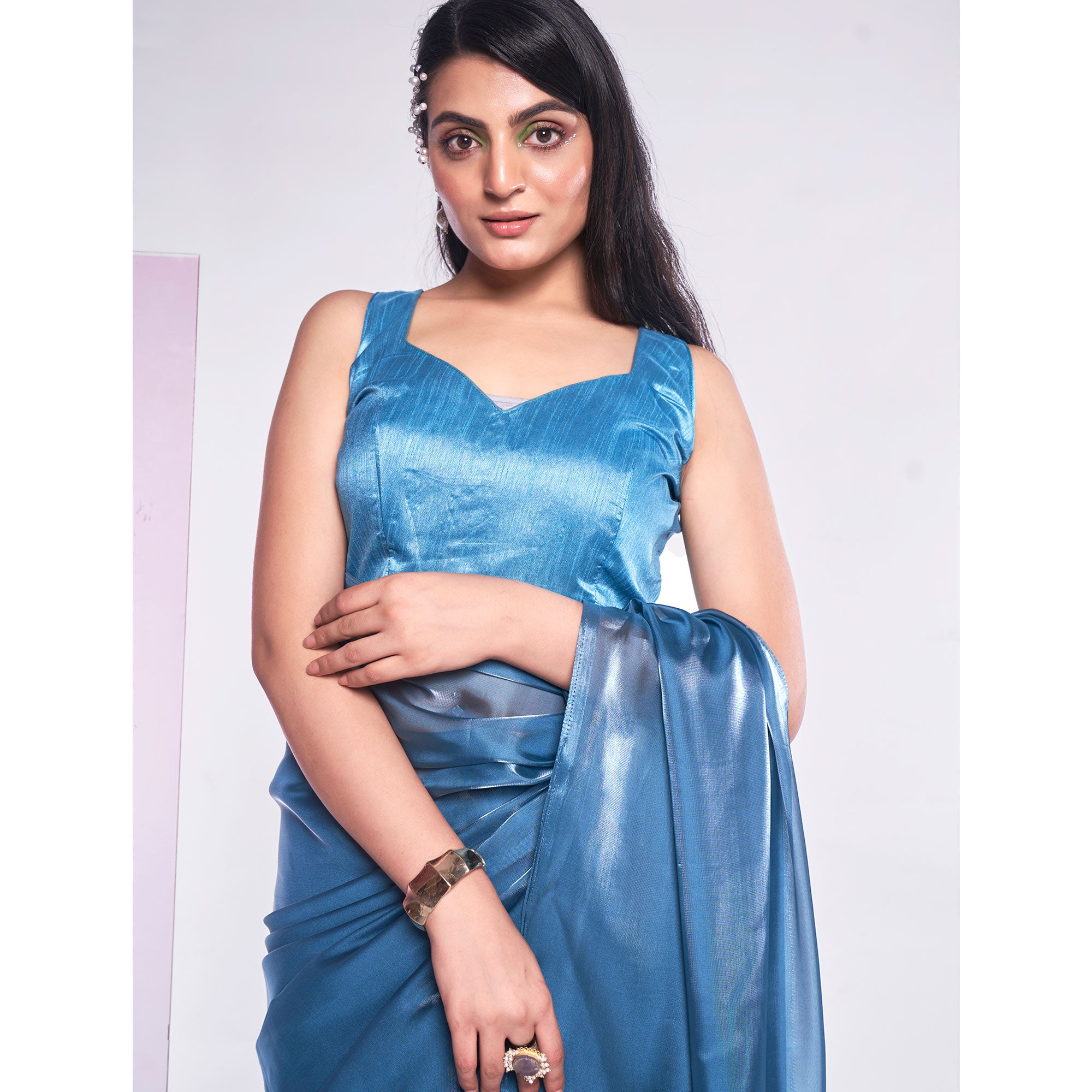 Sea Blue Solid Organza Saree With Tassels