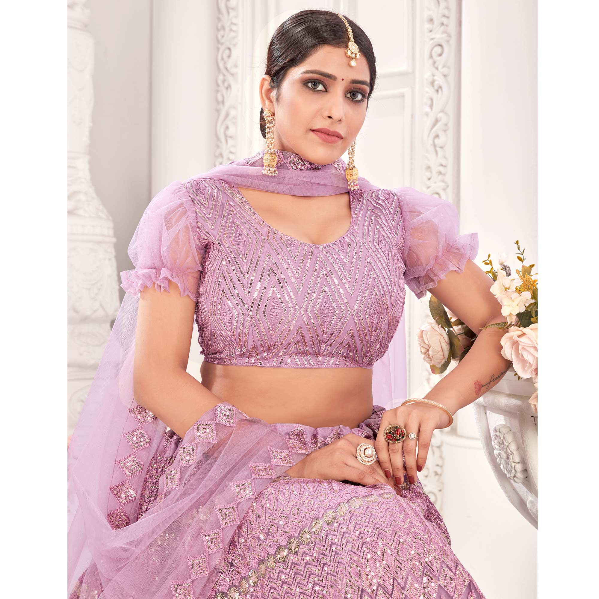 Mauve Sequins Embroidered Netted Lehenga Choli