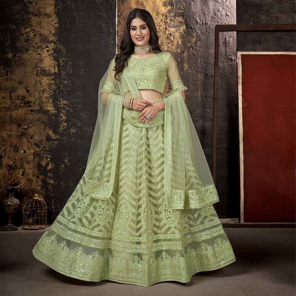 Pista Green Colour Net Fabric Lehenga Choli.