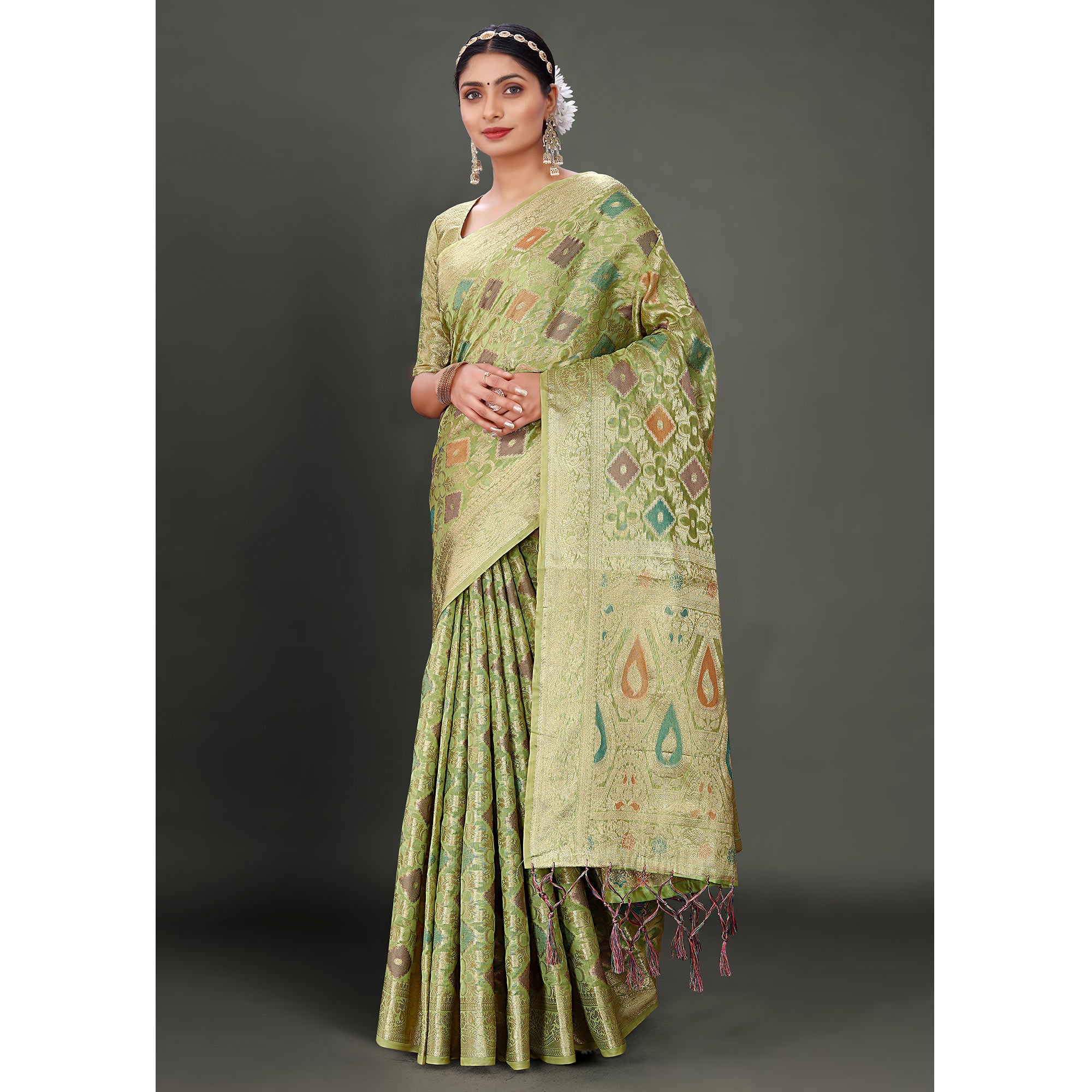 Green Woven Organza Saree With Tassels