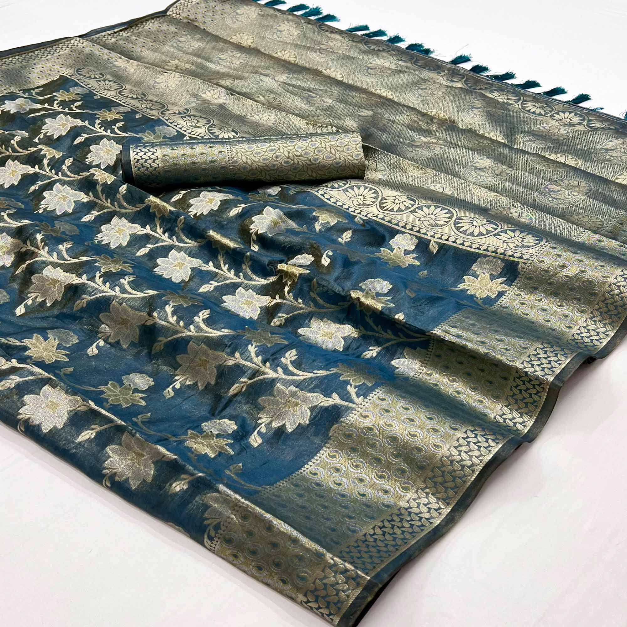 Teal Blue Floral Woven Organza Saree With Tassels