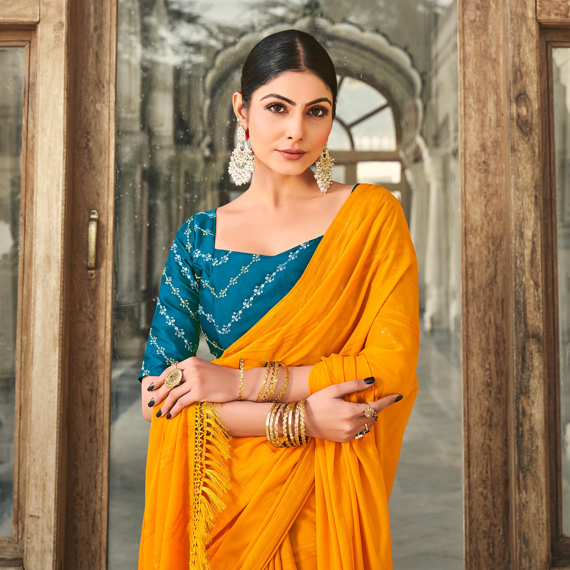 Mustard Printed Georgette Saree With Tassels