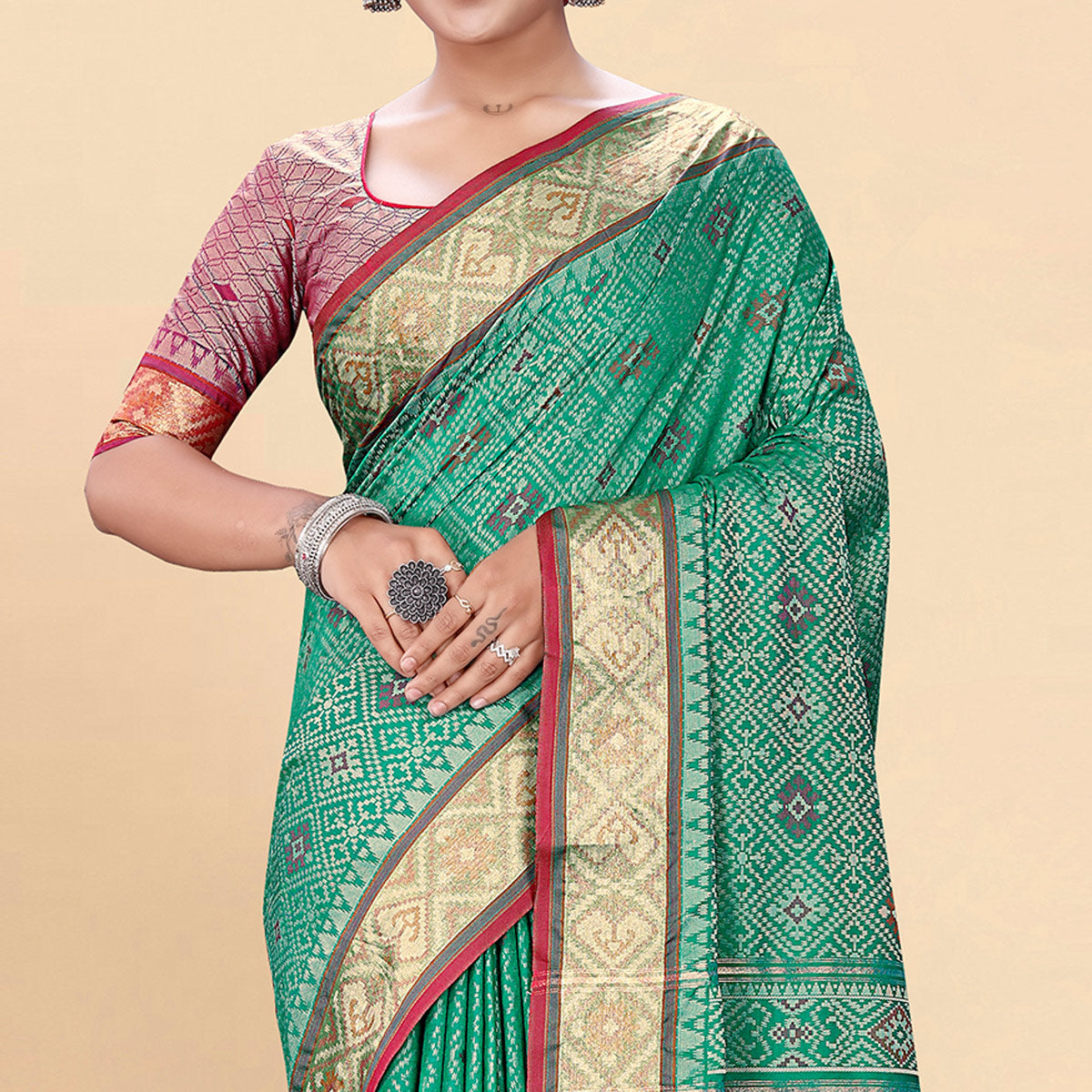 Green Woven Patola Art Silk Saree With Tassels