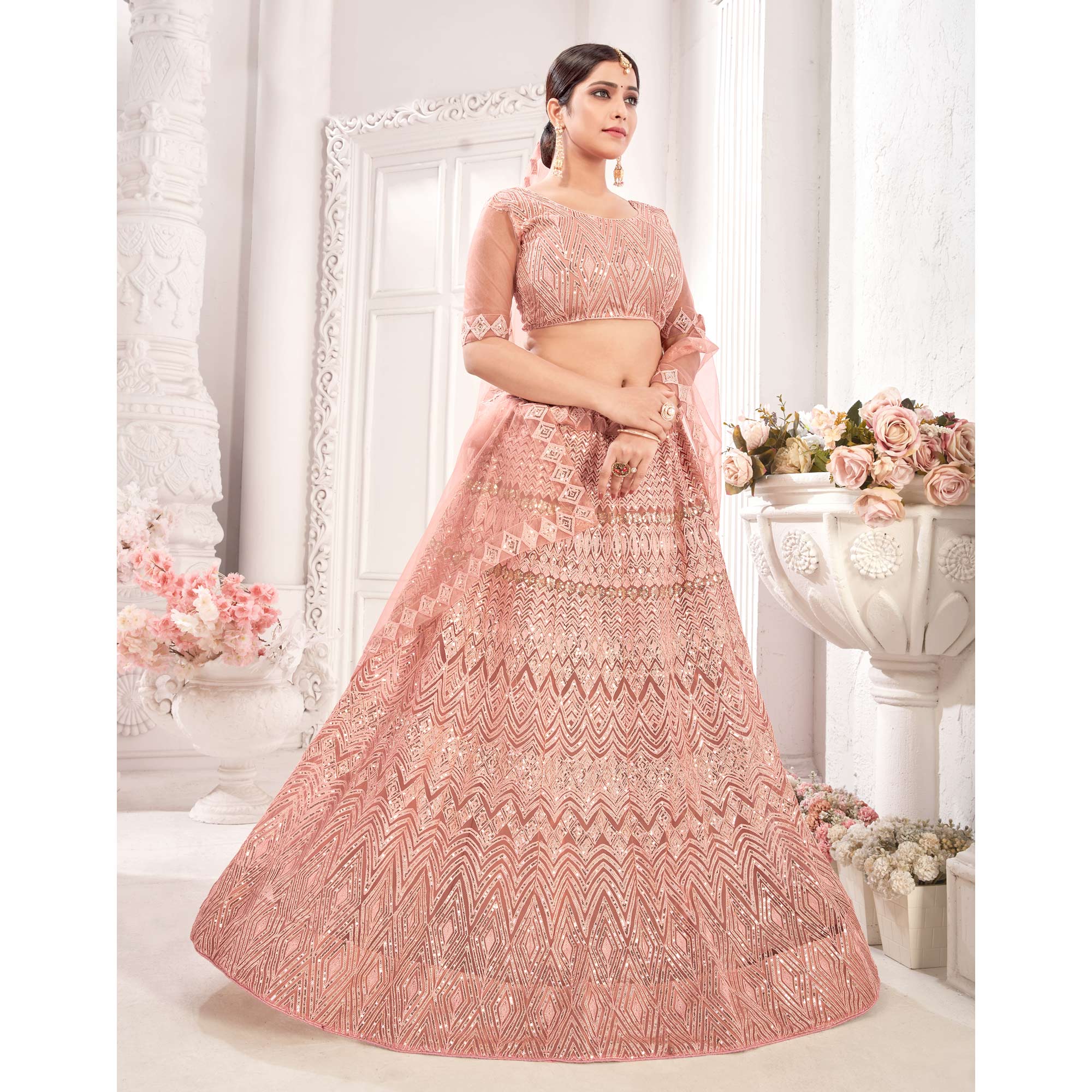 Peach Sequins Embroidered Netted Lehenga Choli