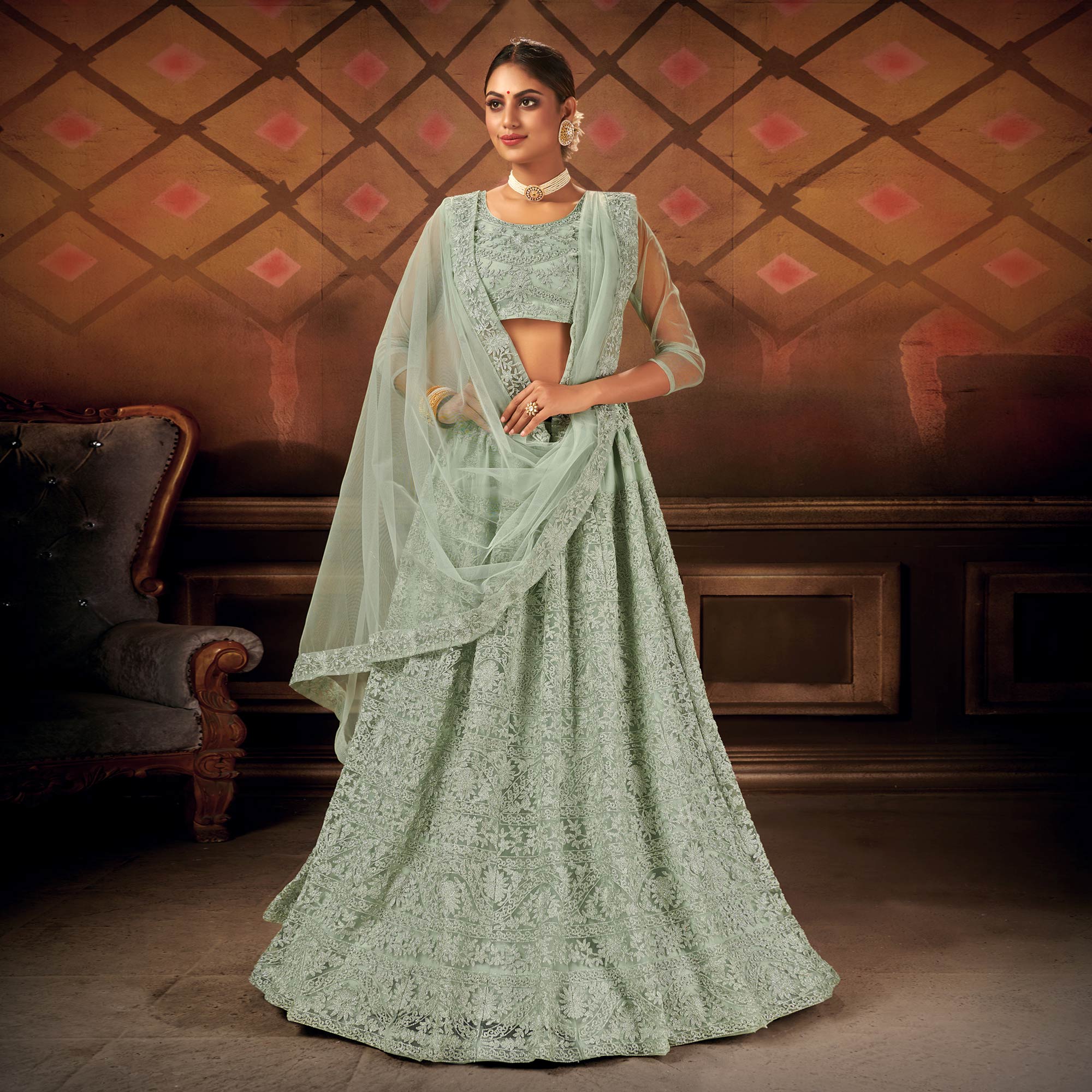 Green Embroidered Netted Lehenga Choli