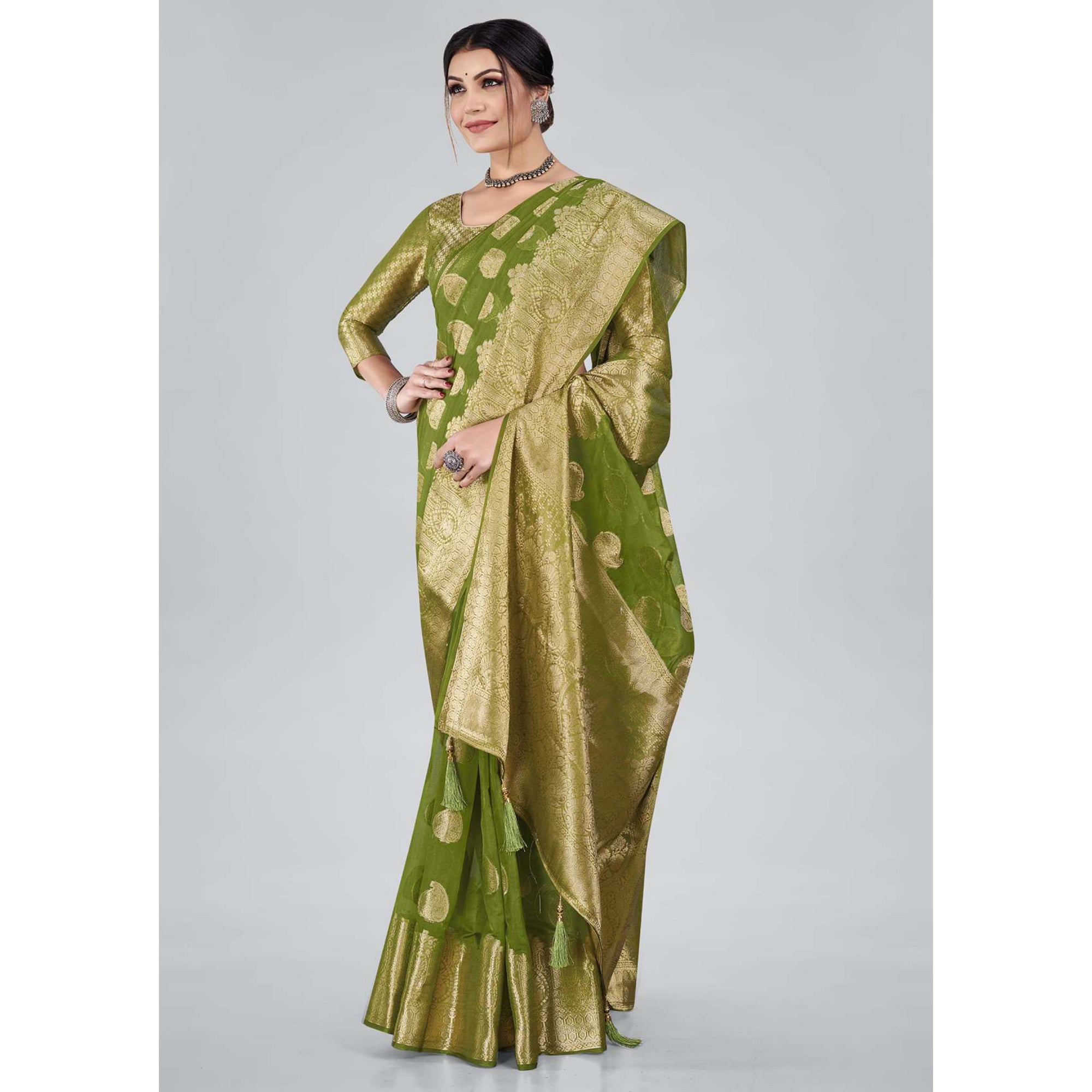 Green Woven Organza Saree With Tassels