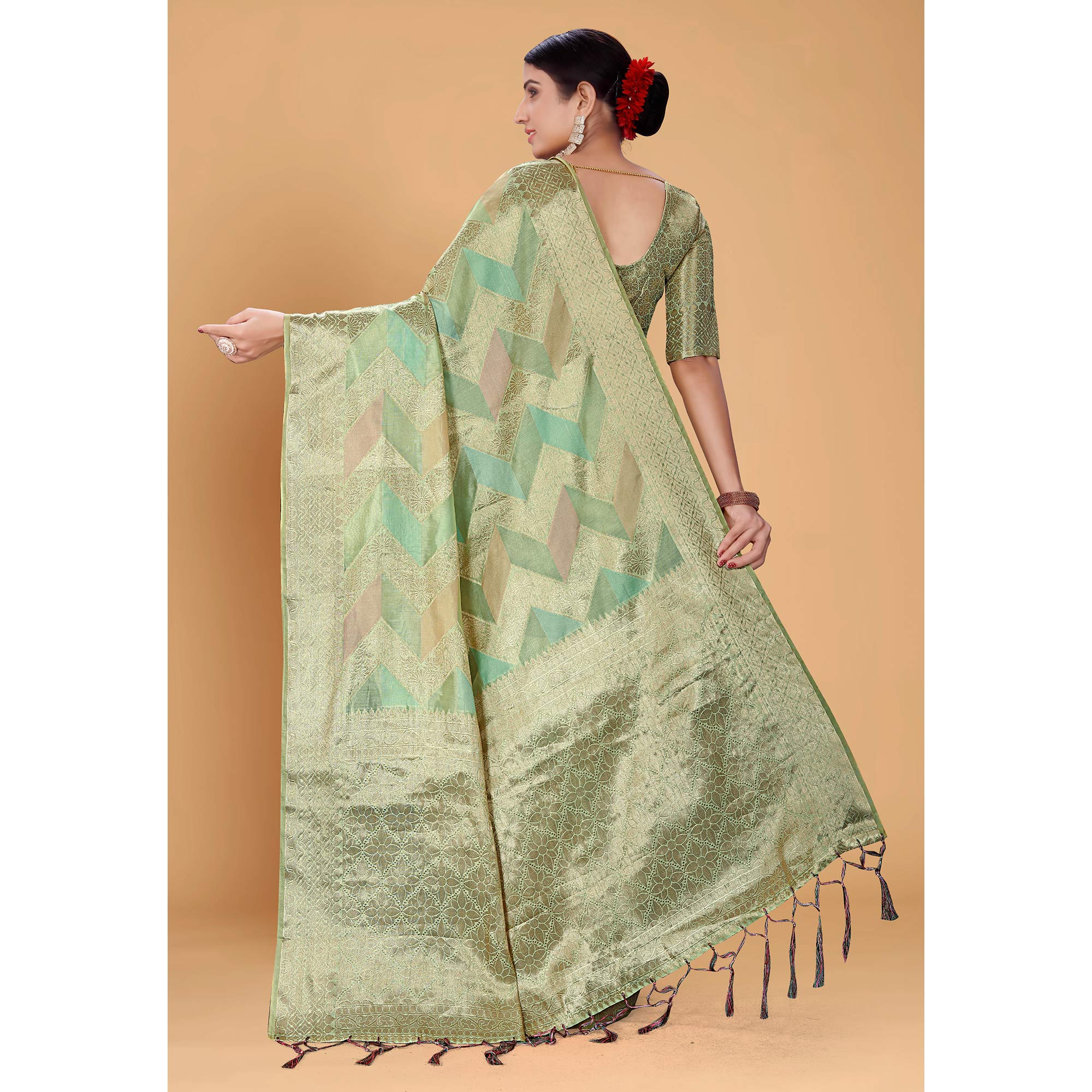 Green Woven Organza Saree With Tassels