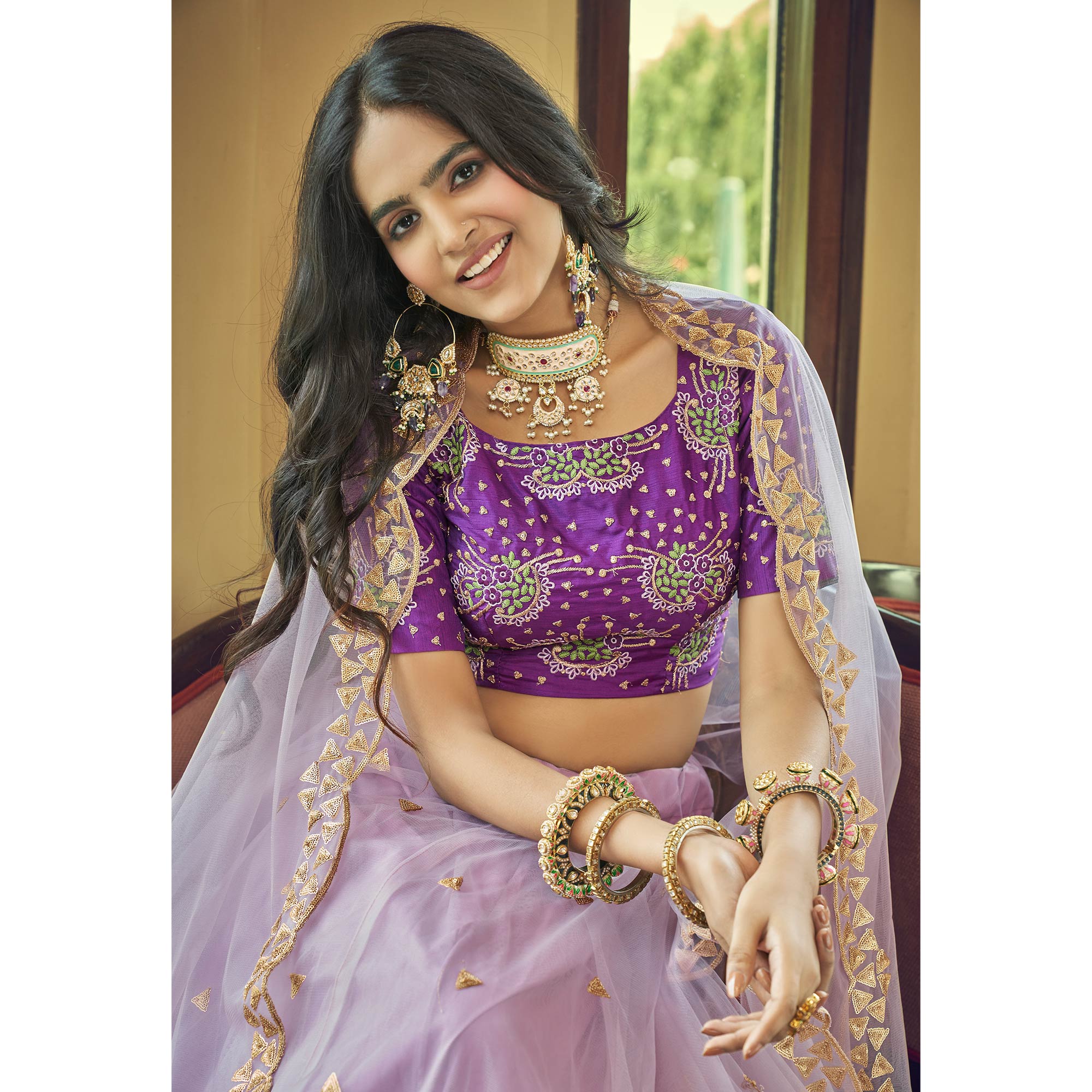Lavender Sequins Embroidered Netted Lehenga Choli