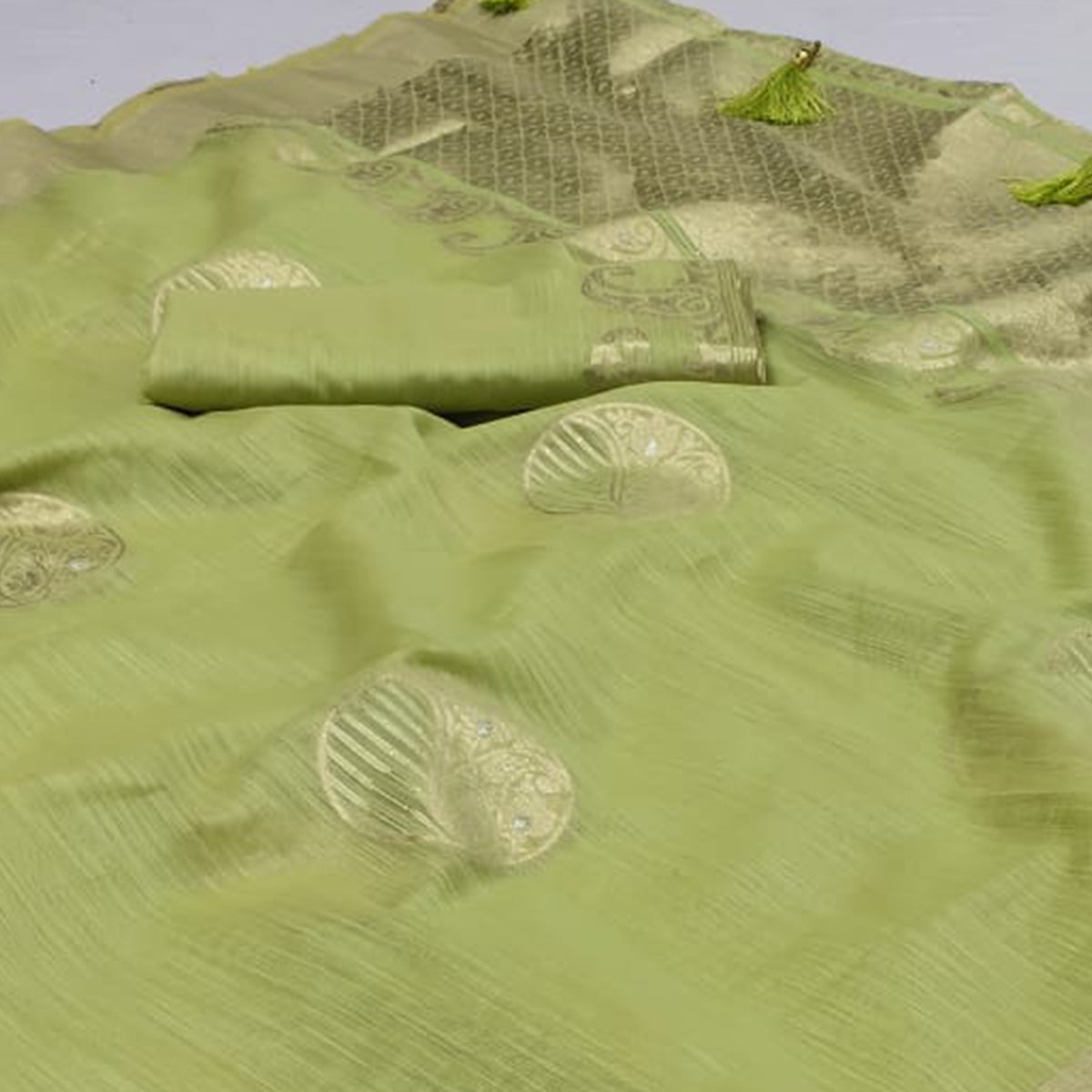 Green Woven Art Silk Saree With Tassels