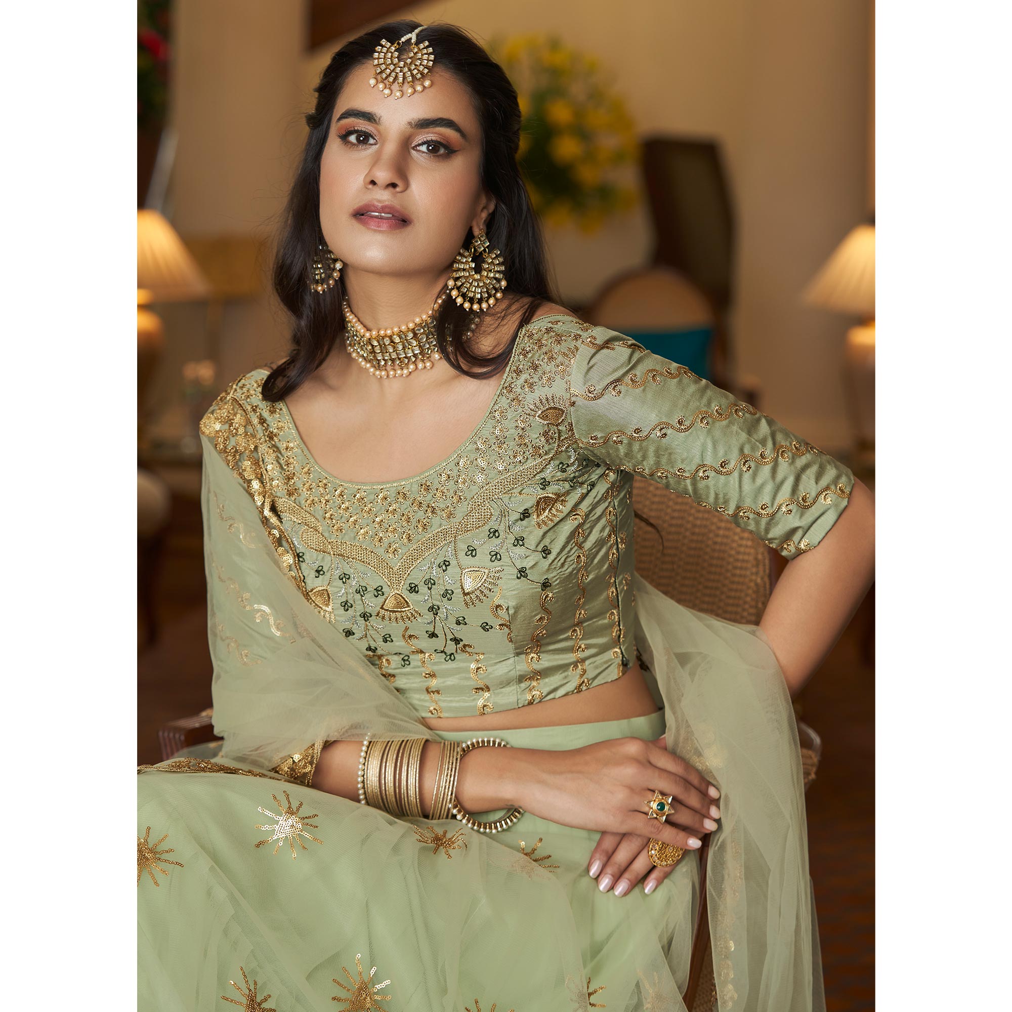 Pista Green Sequins Embroidered Netted Lehenga Choli