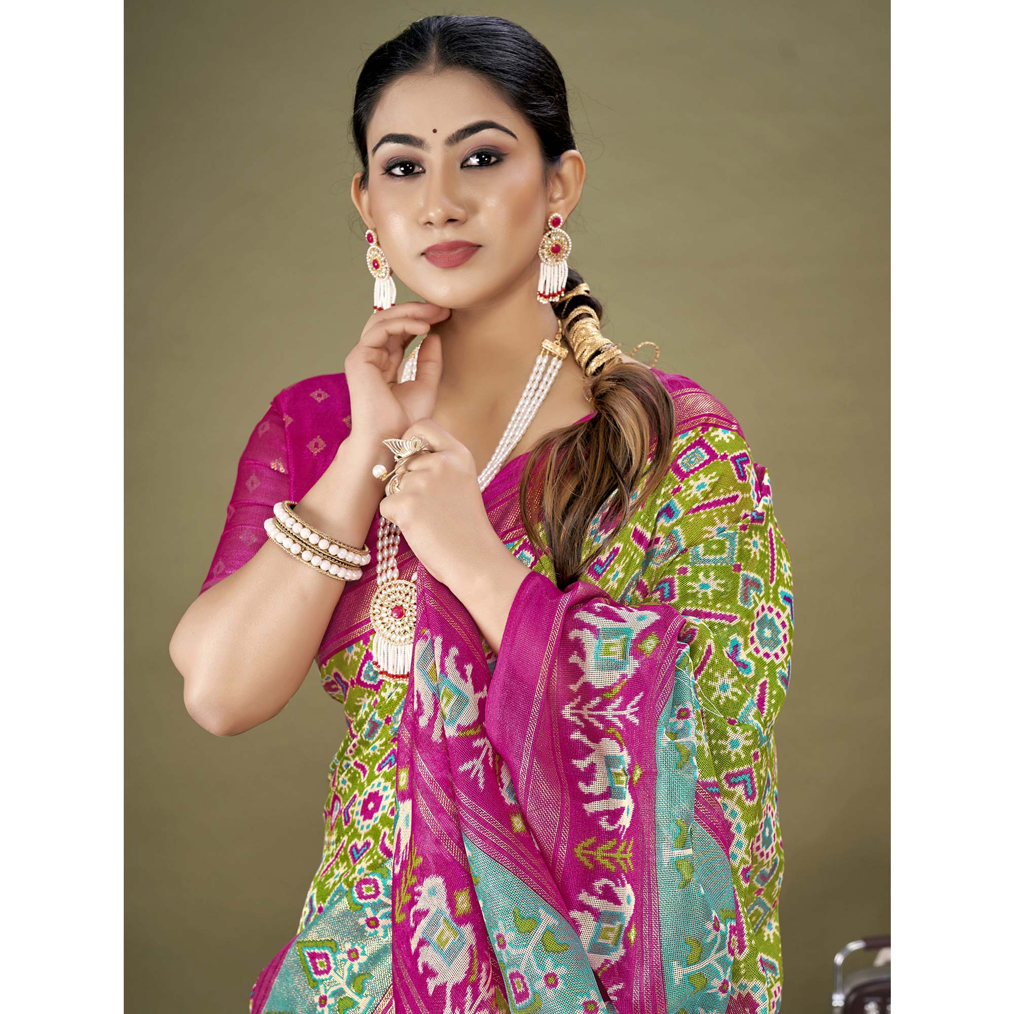 Green Printed Jute Patola Saree
