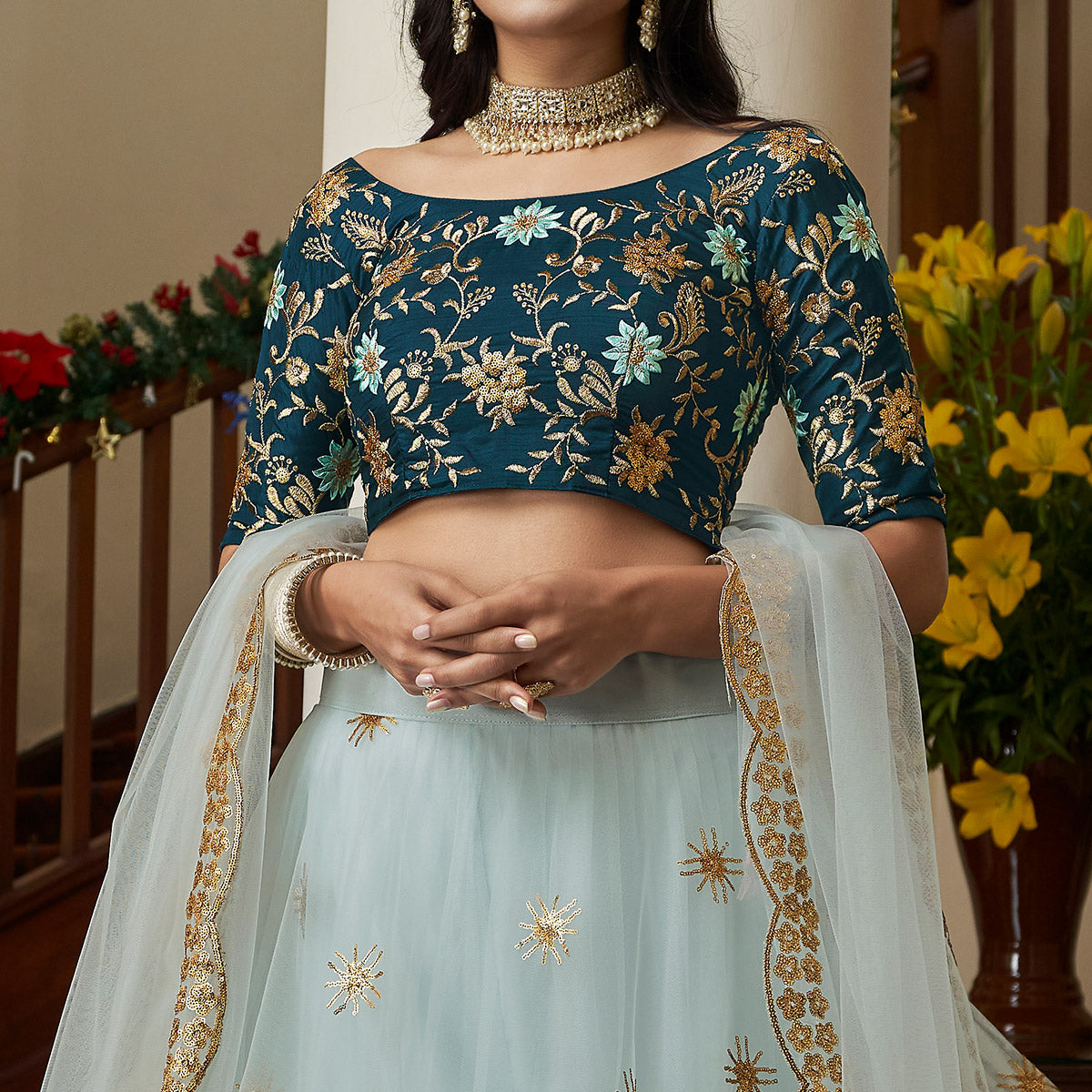 Sky Blue Sequins Embroidered Netted Lehenga Choli