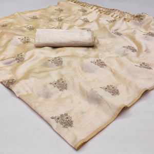 Cream Floral Embroidered Assam Silk Saree With Tassels