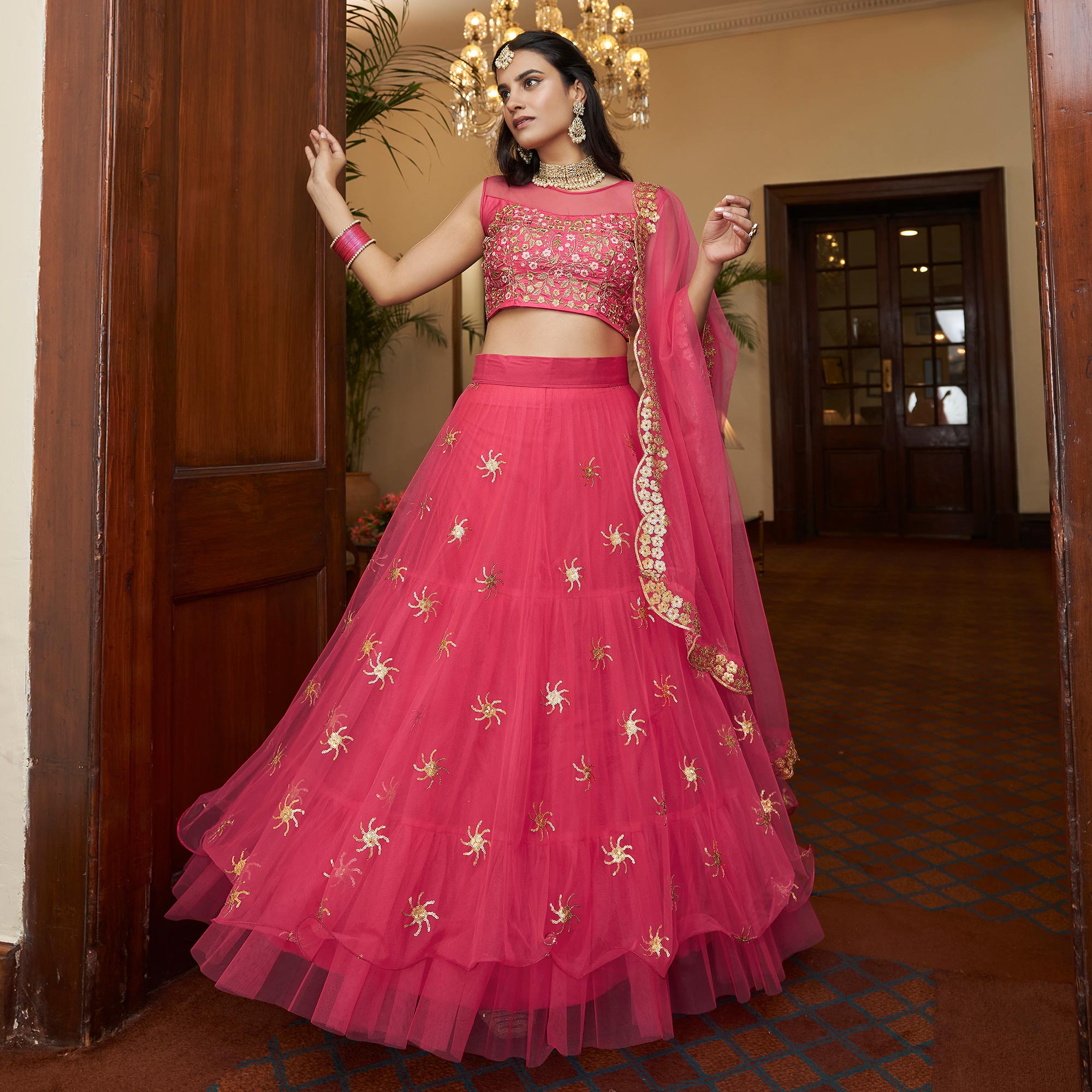 Bright Pink Sequins Embroidered Netted Lehenga Choli