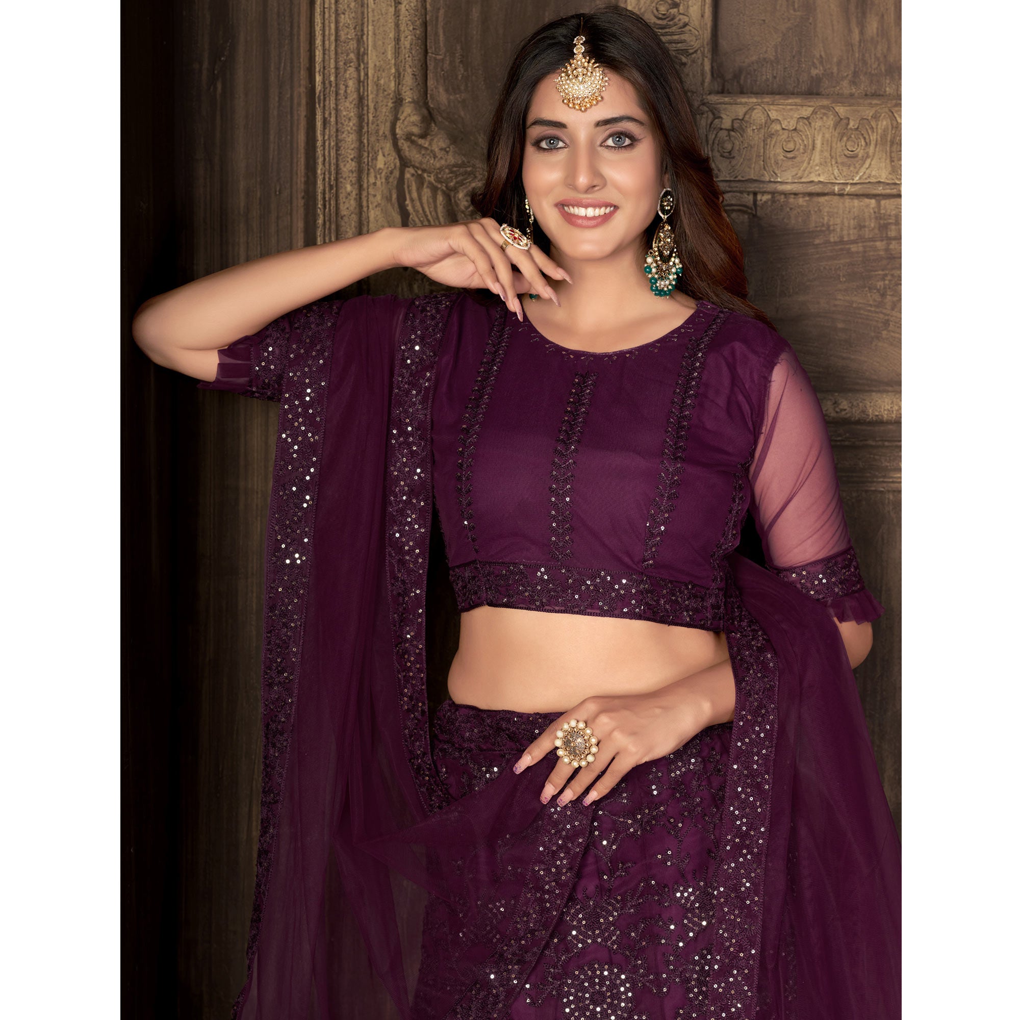 Wine Sequins Embroidered Netted Lehenga Choli