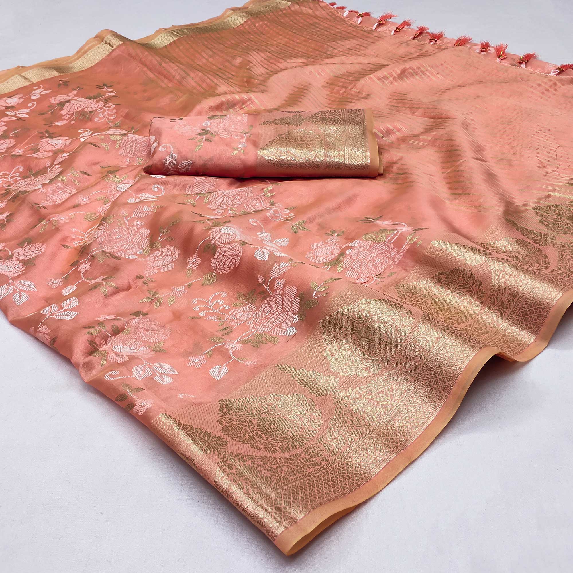 Peach Woven Organza Saree With Tassels