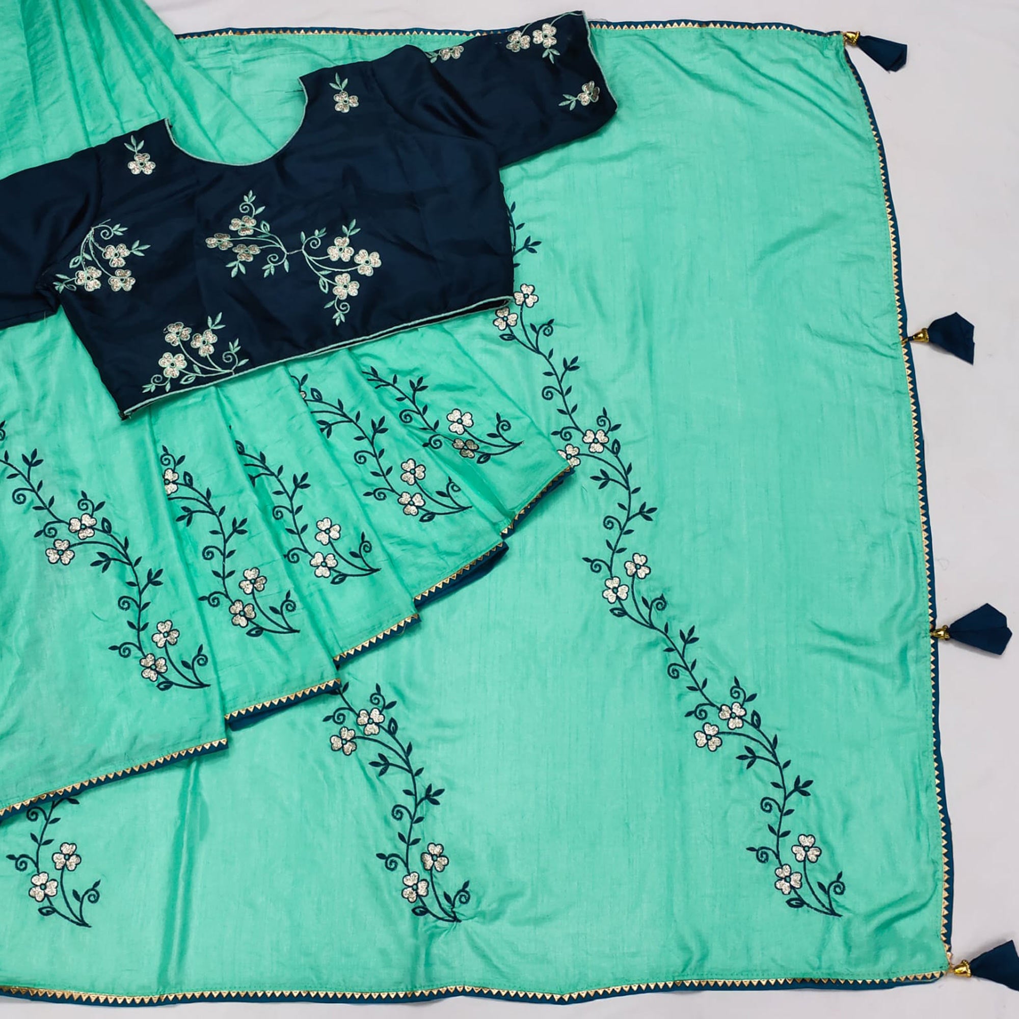 Turquoise Floral Embroidered Dola Silk Saree