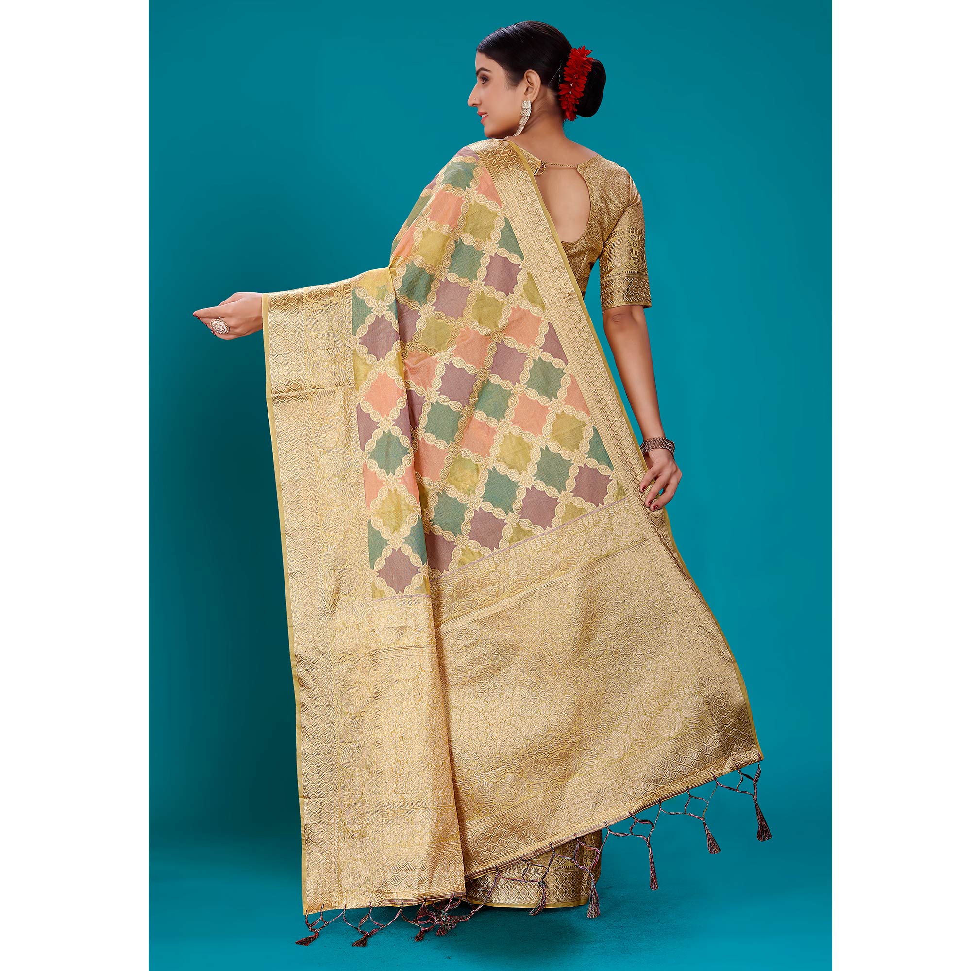 Light Pista Green Woven Organza Saree With Tassels