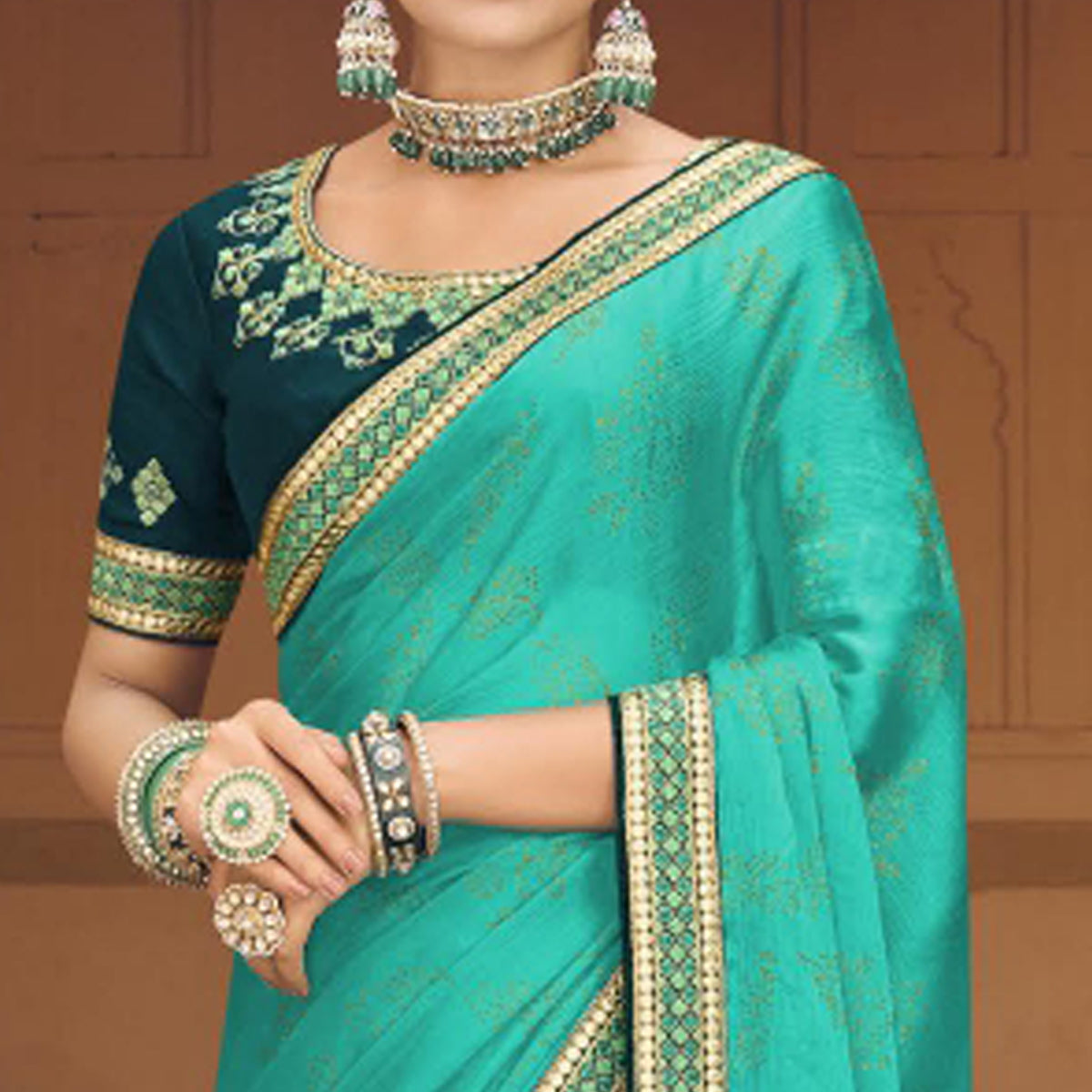 Sea Green Embellished With Embroidered Border Satin Saree