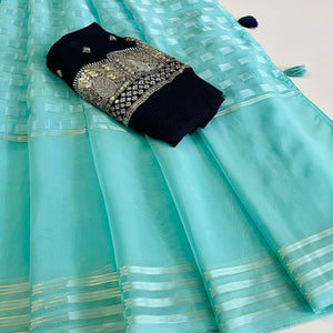 Turquoise Woven Georgette Saree With Tassels