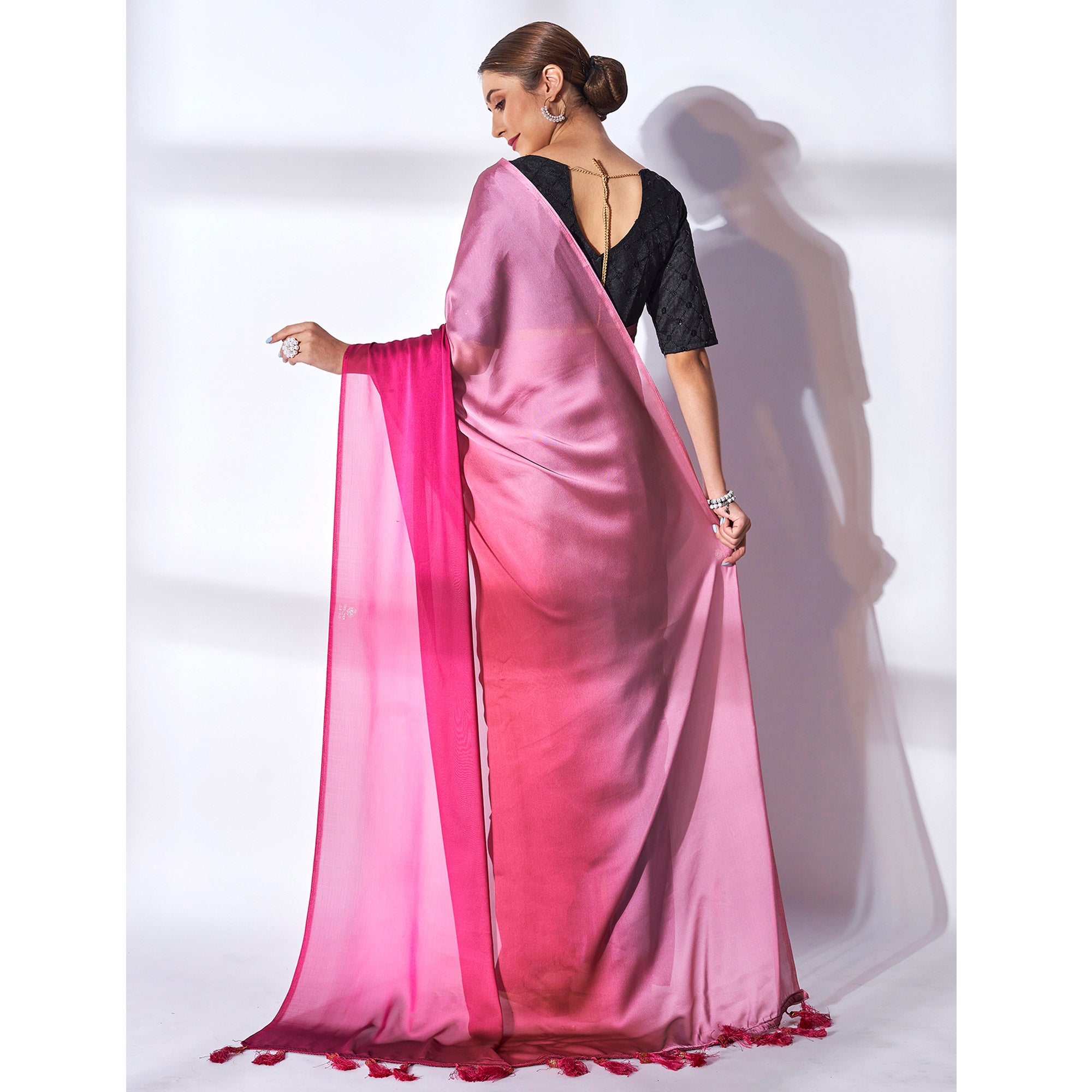 Pink Solid Georgette Saree With Tassels