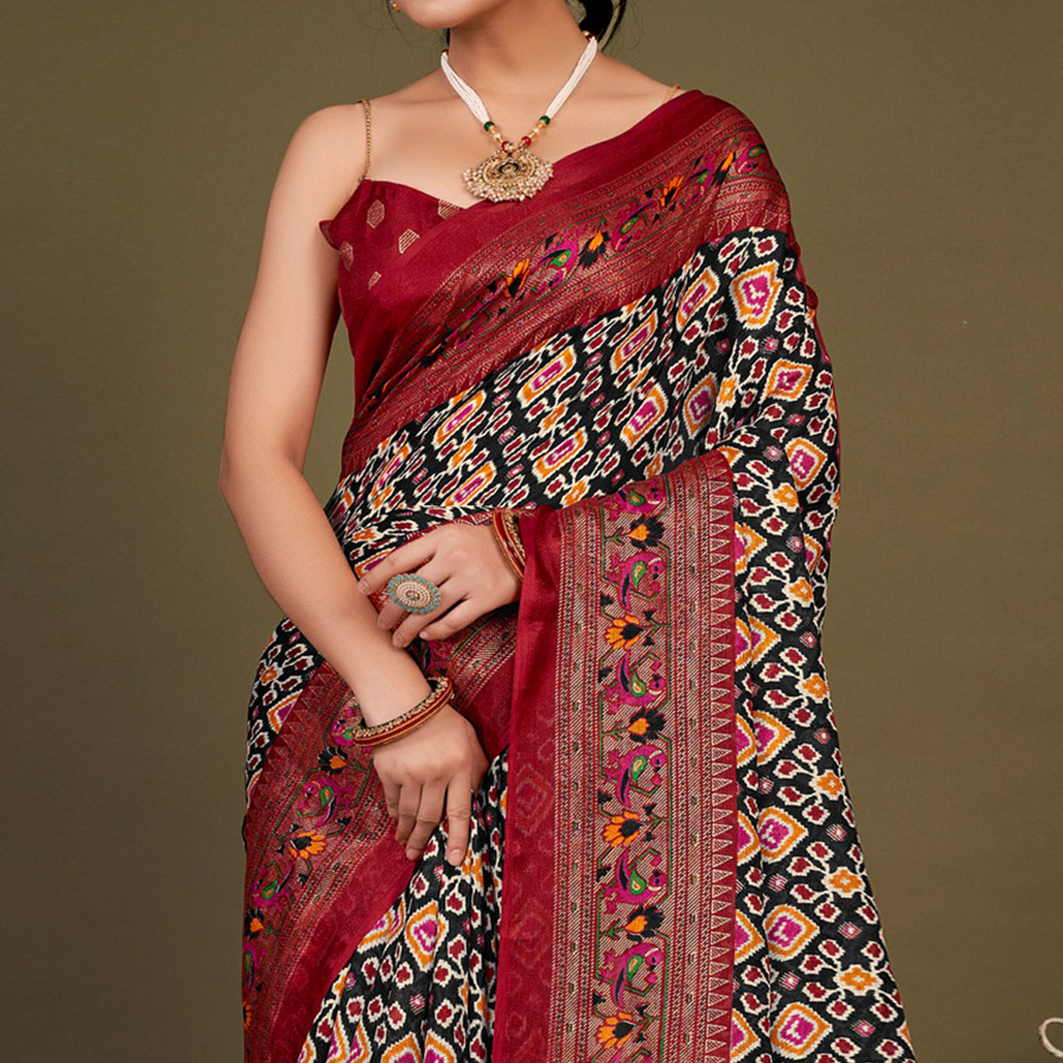 Black Printed Jute Patola Saree With Tassels
