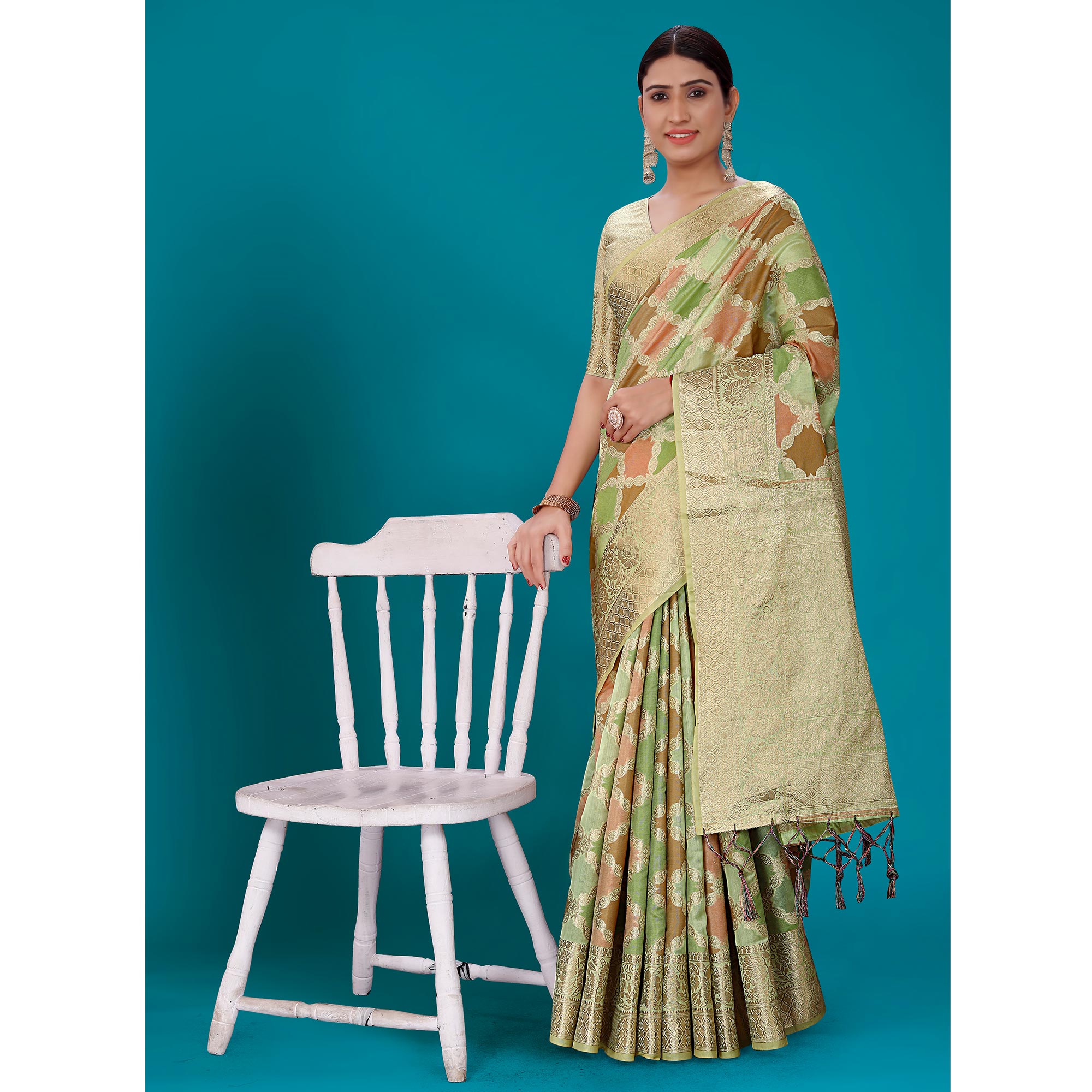 Green Woven Organza Saree With Tassels