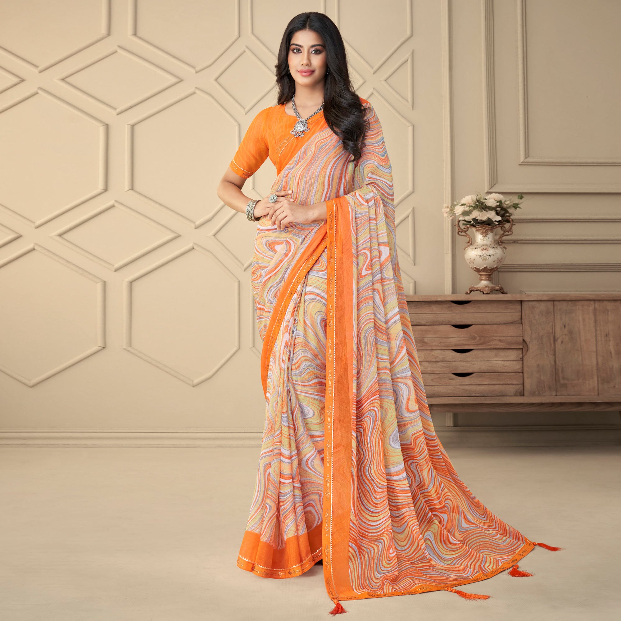 Orange Printed Chiffon Saree With Tassels