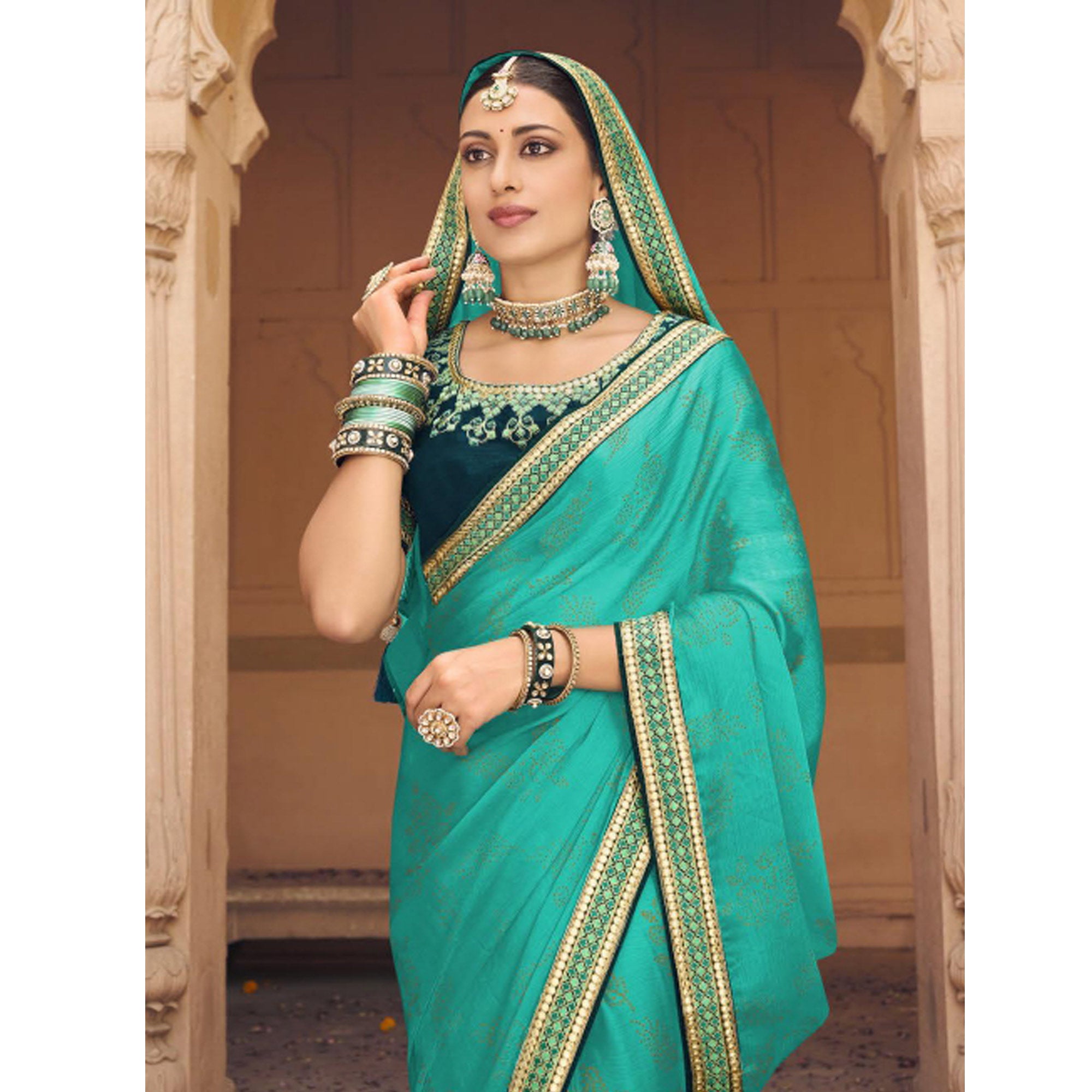 Sea Green Embellished With Embroidered Border Satin Saree