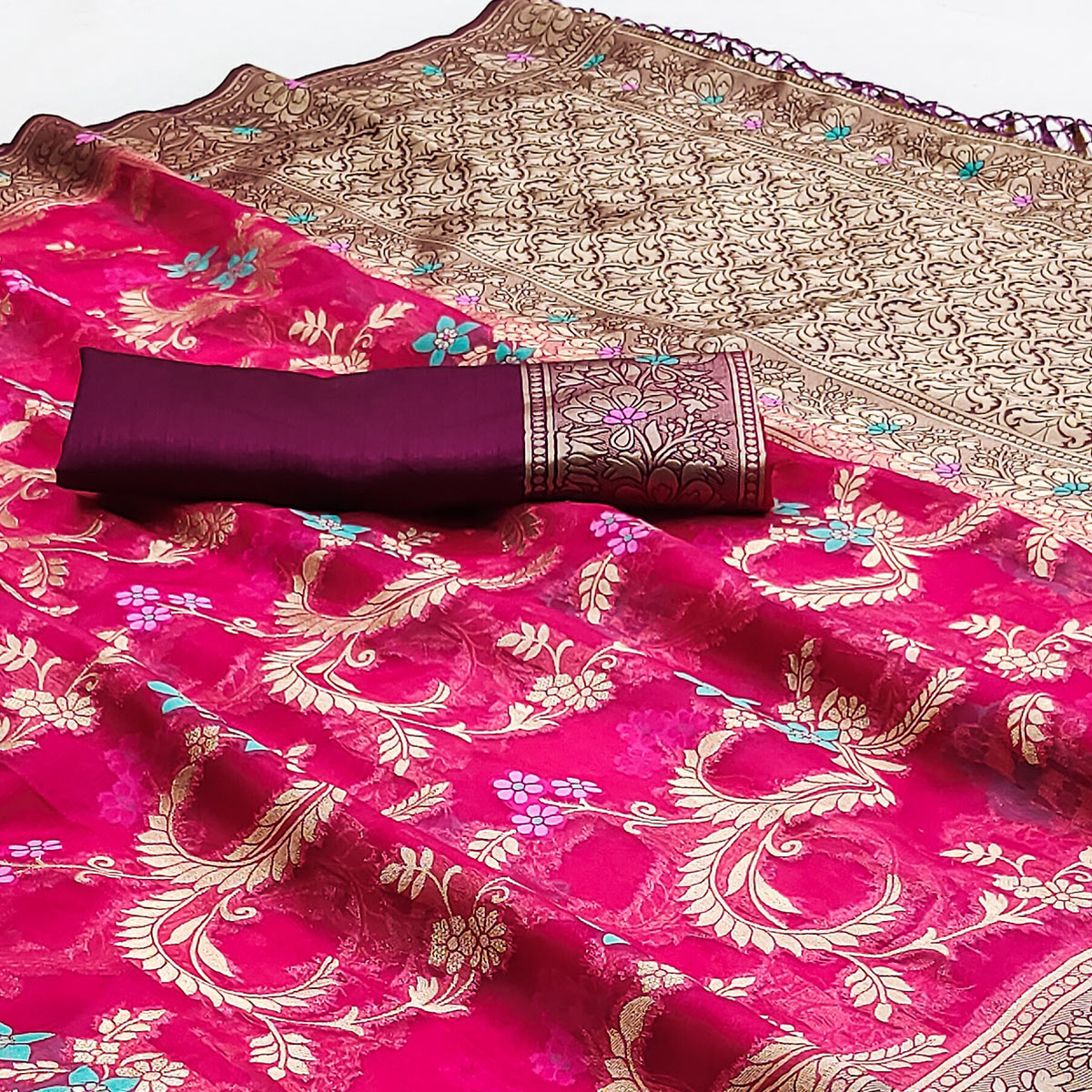 Pink Floral Woven Organza Saree With Tassels