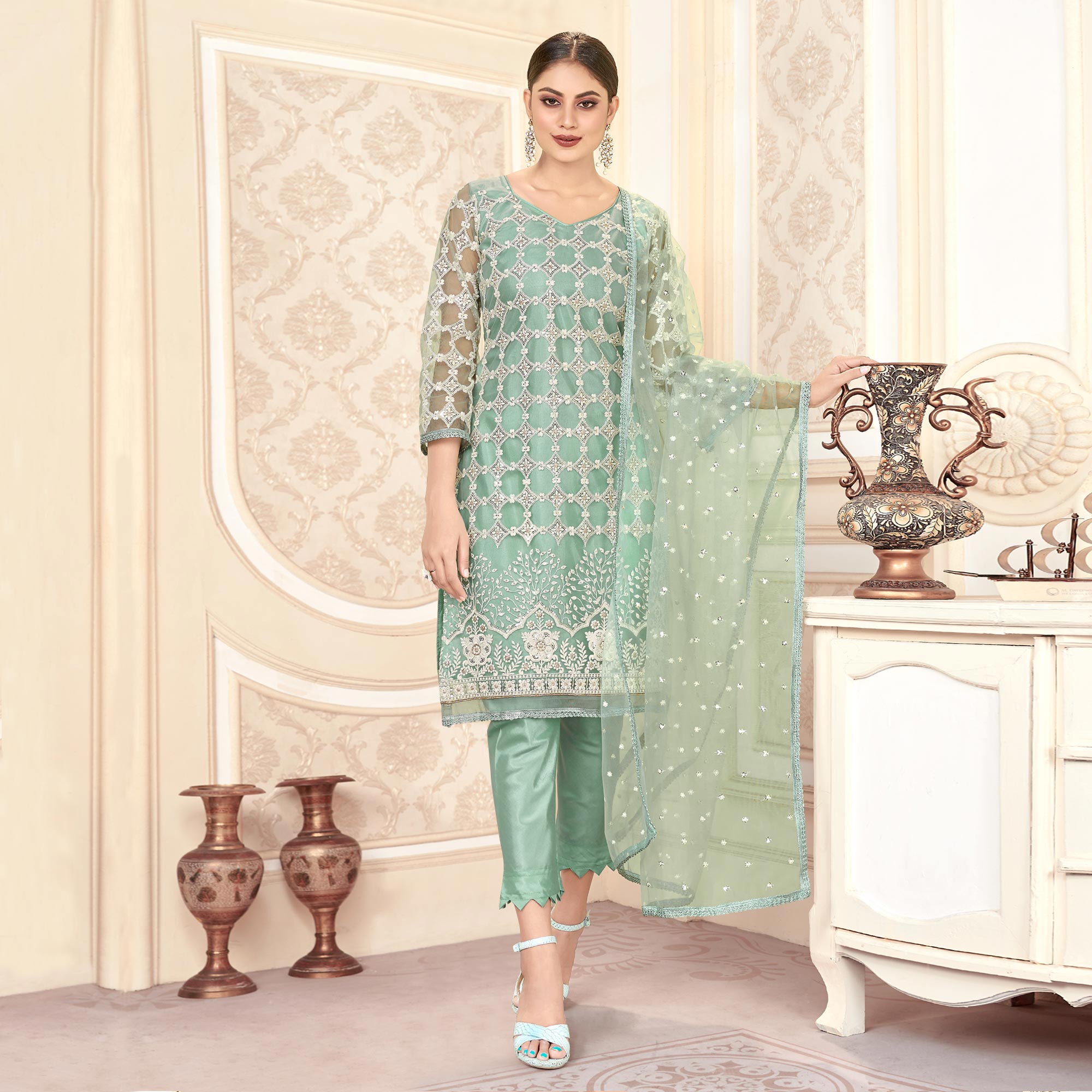 Turquoise Sequins Embroidered Net Semi Stitched Suit