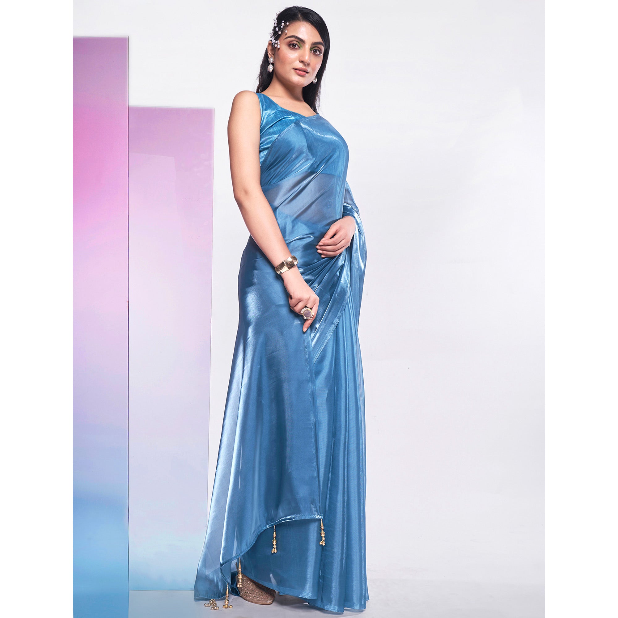 Sea Blue Solid Organza Saree With Tassels