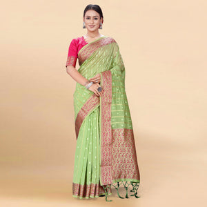 Green Woven Organza Saree With Tassels