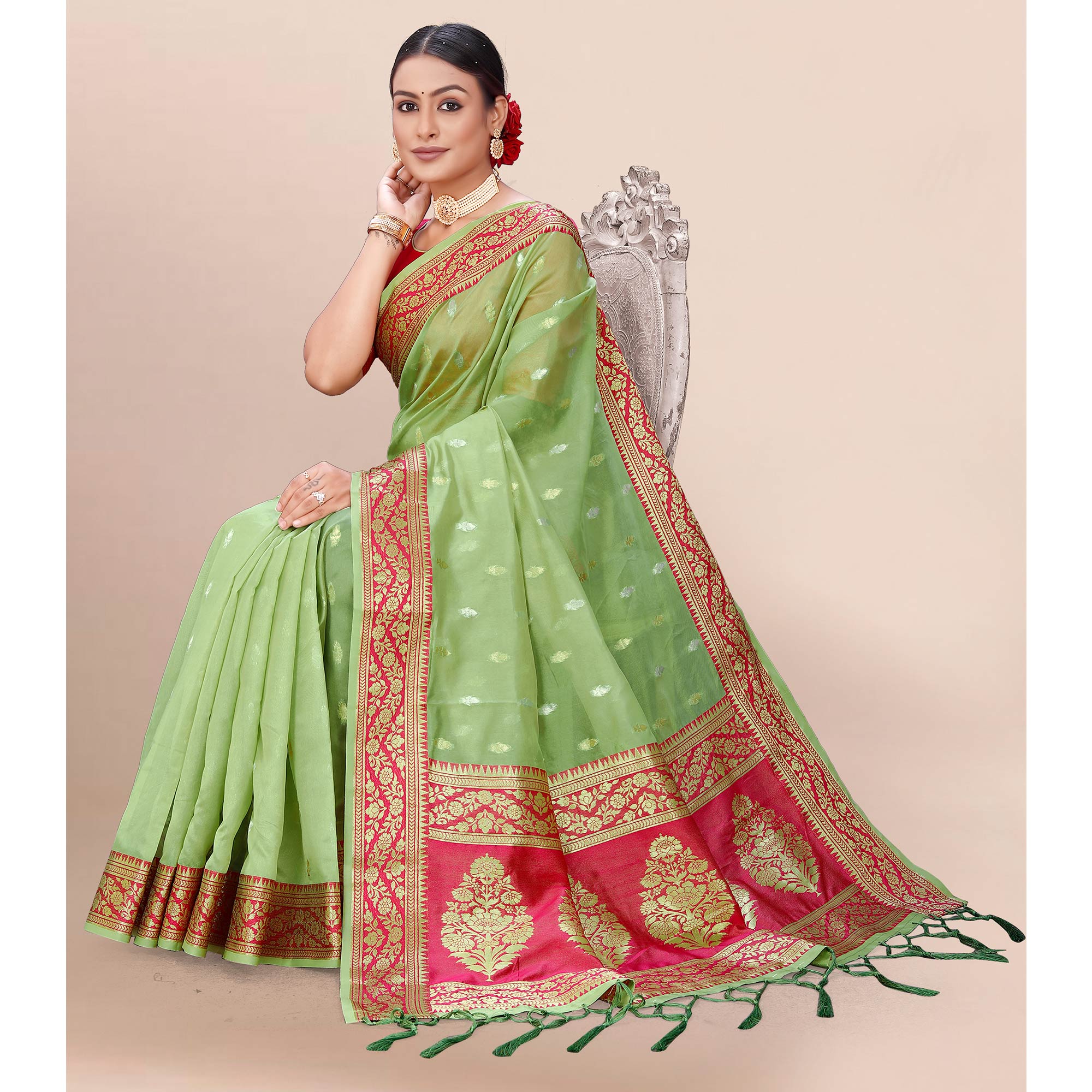 Pista Green Woven Organza Saree With Tassels