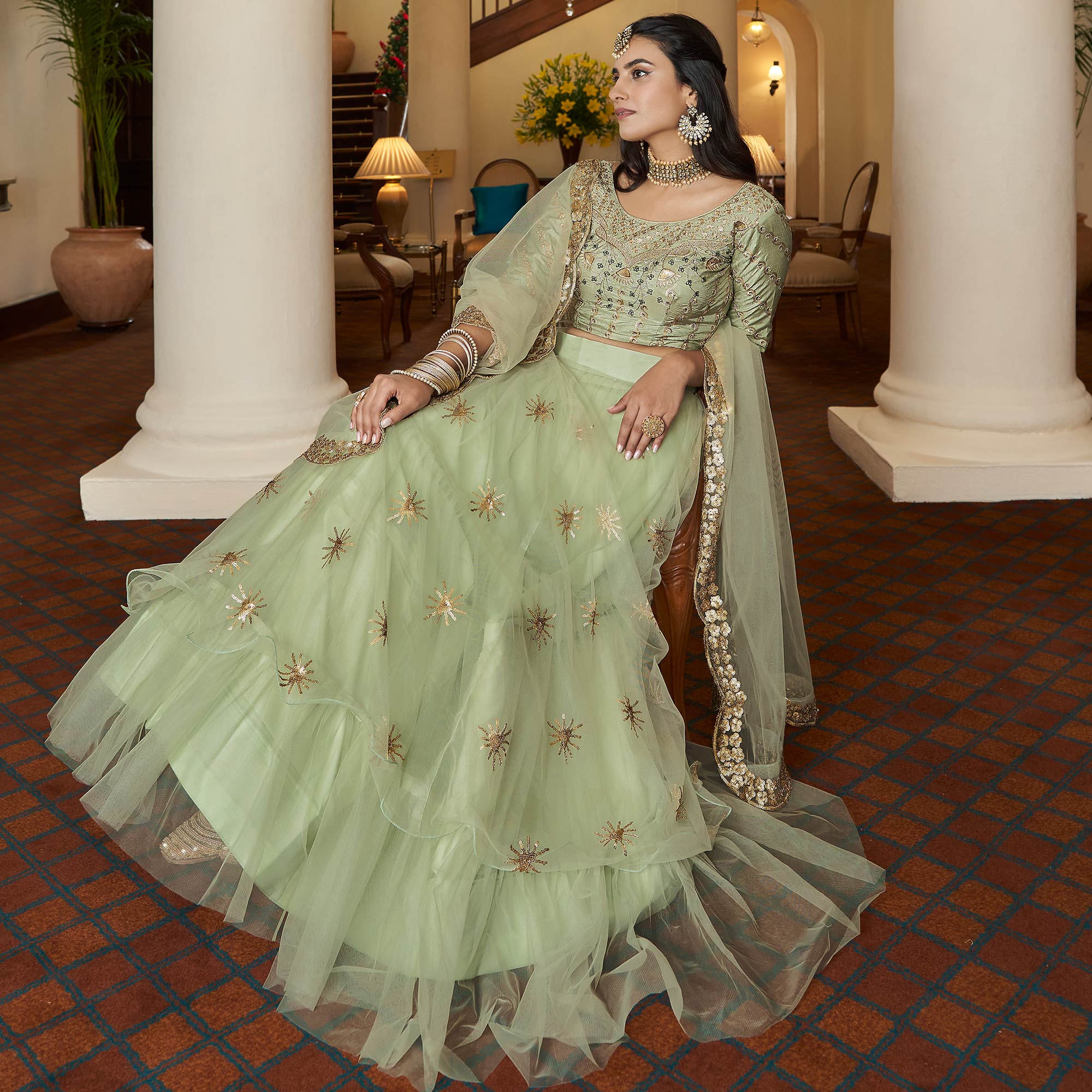 Pista Green Sequins Embroidered Netted Lehenga Choli