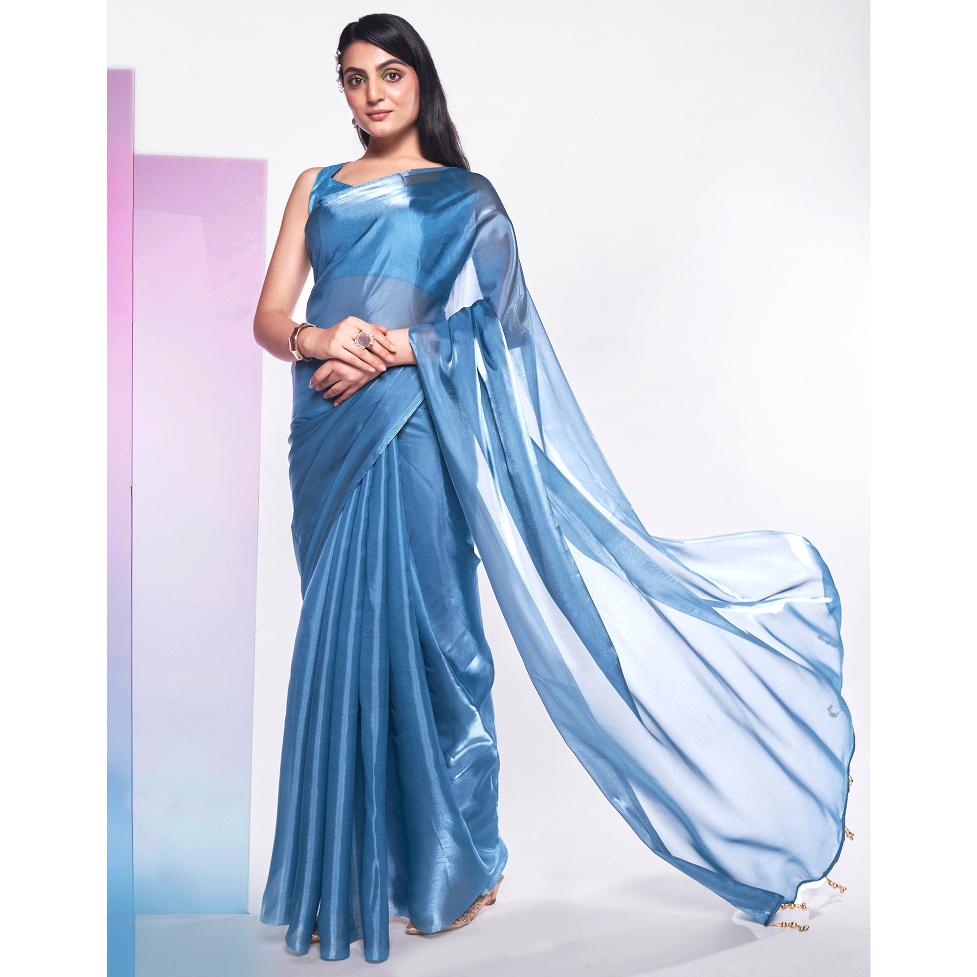 Sea Blue Solid Organza Saree With Tassels