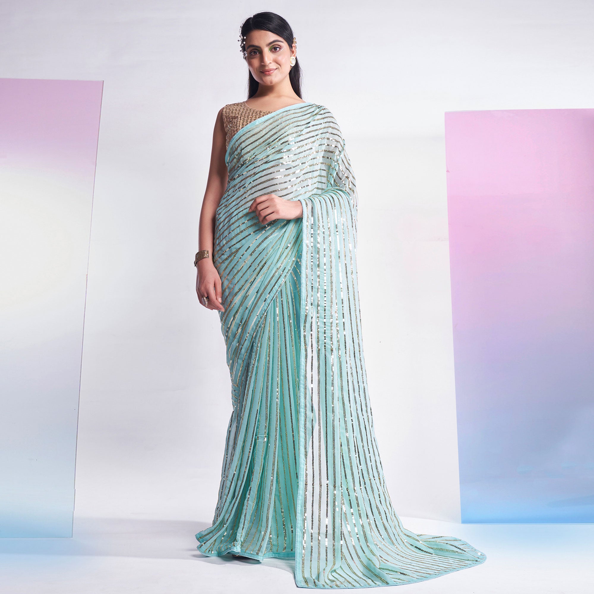 Turquoise Sequins Embroidered Georgette Saree