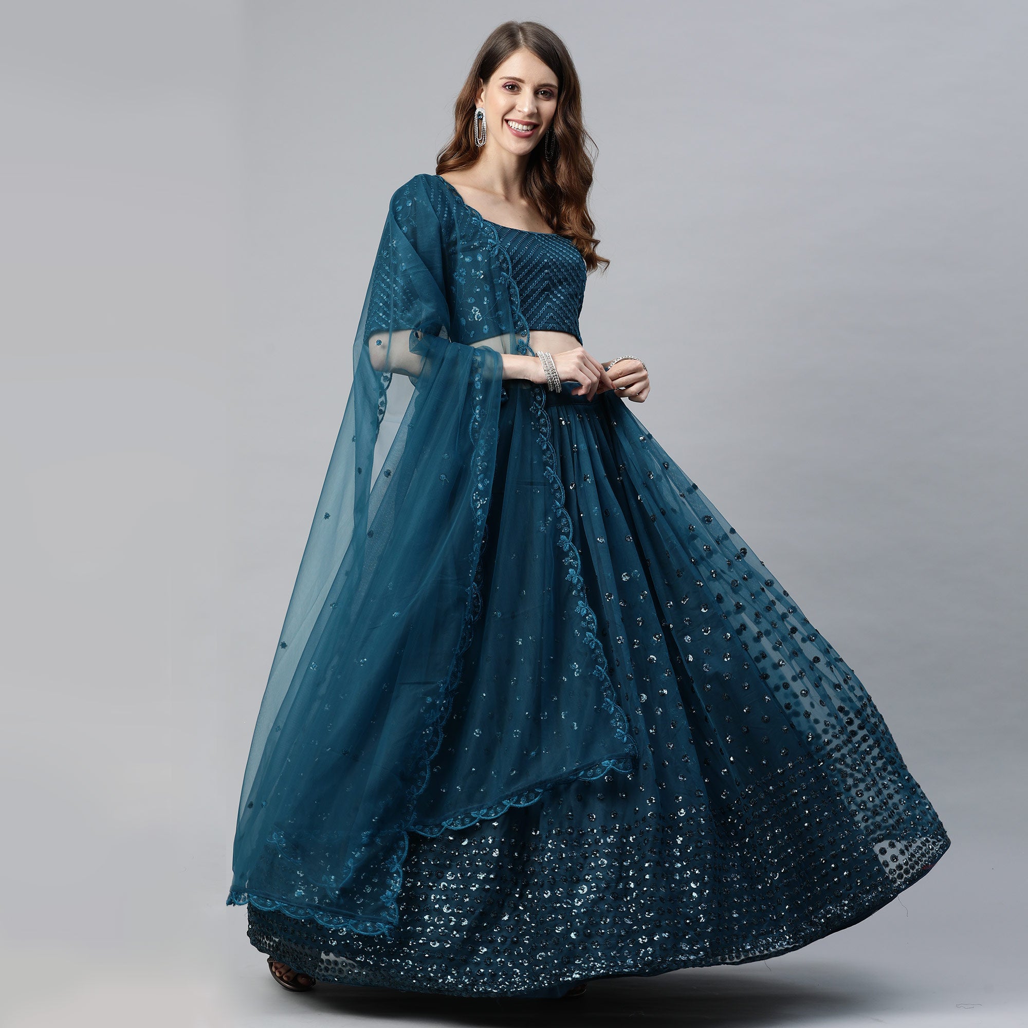 Teal Blue Sequins Embroidered Net Lehenga Choli