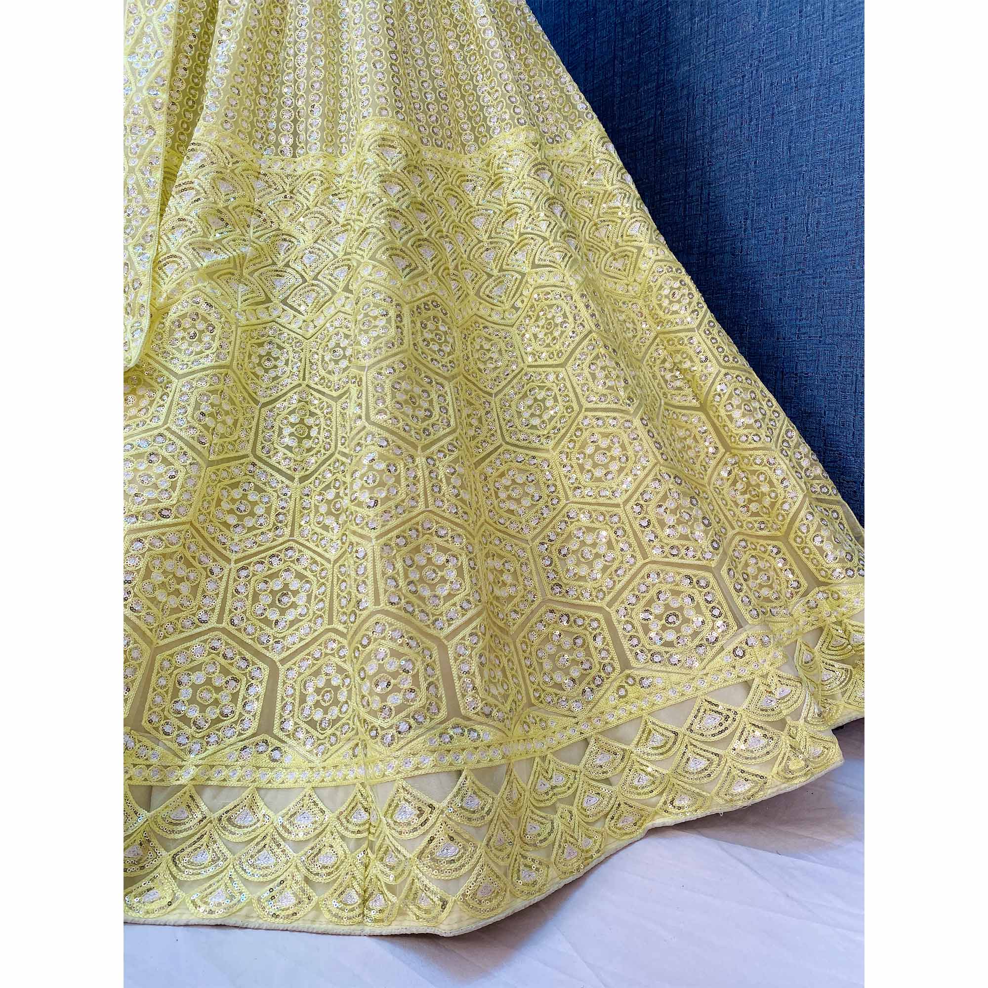 Lemon Yellow Sequins Embroidered Netted Lehenga Choli