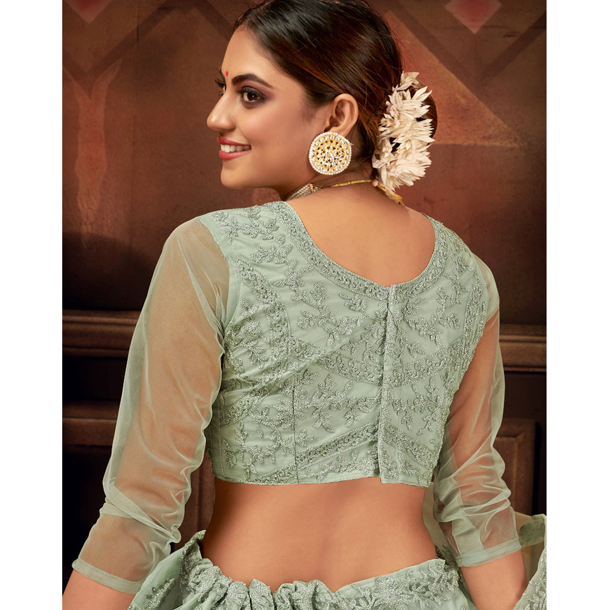 Green Embroidered Netted Lehenga Choli