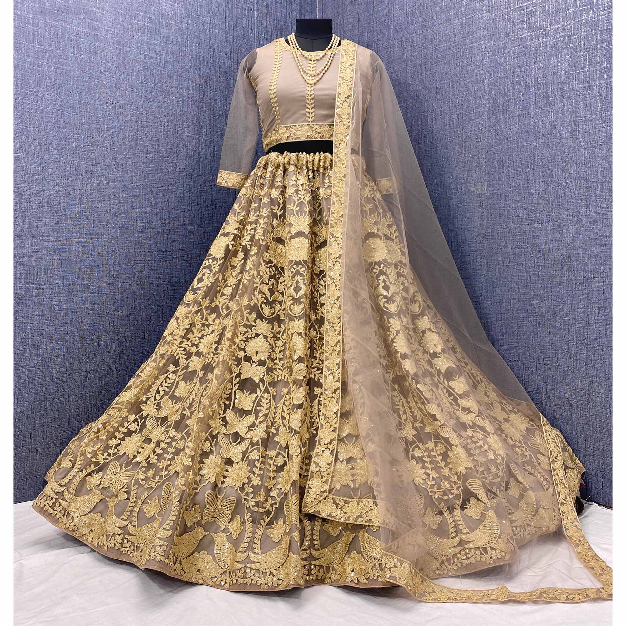 Brown Sequins Embroidered Netted Lehenga Choli