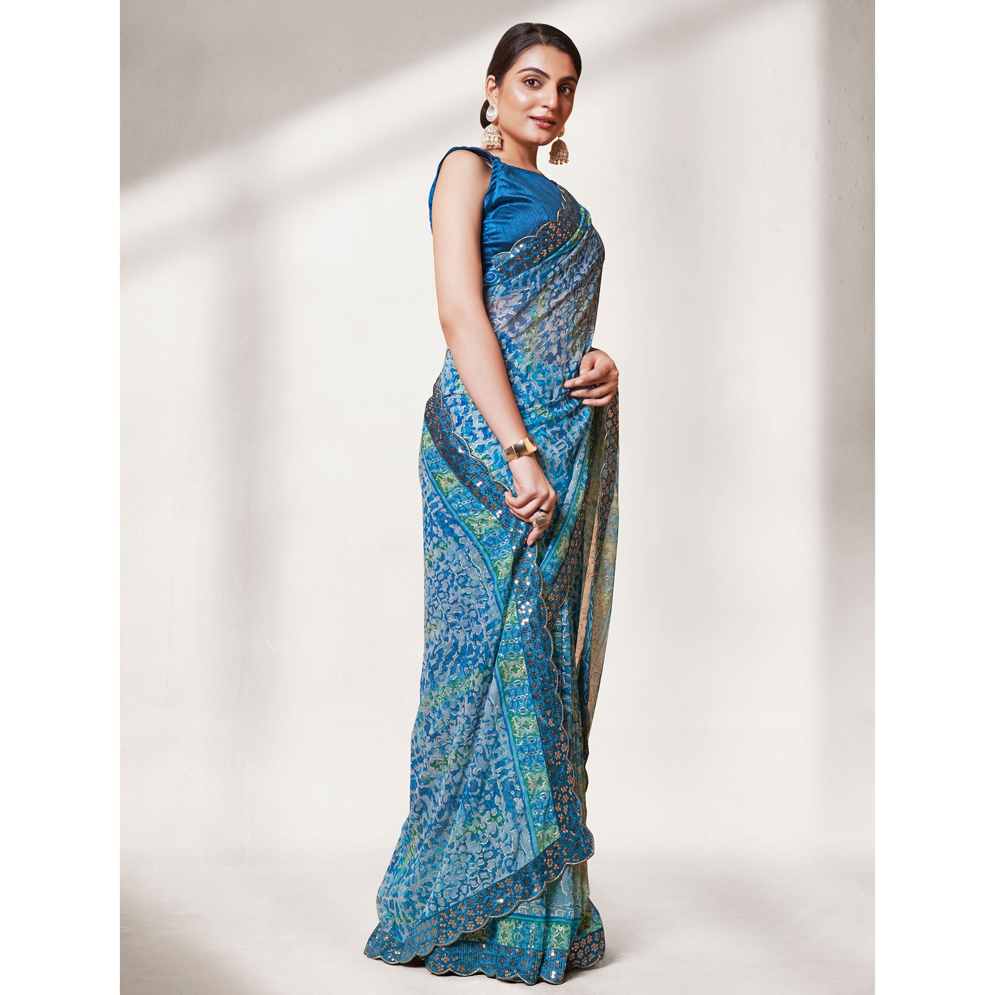 Blue Printed With Sequins Border Georgette Saree