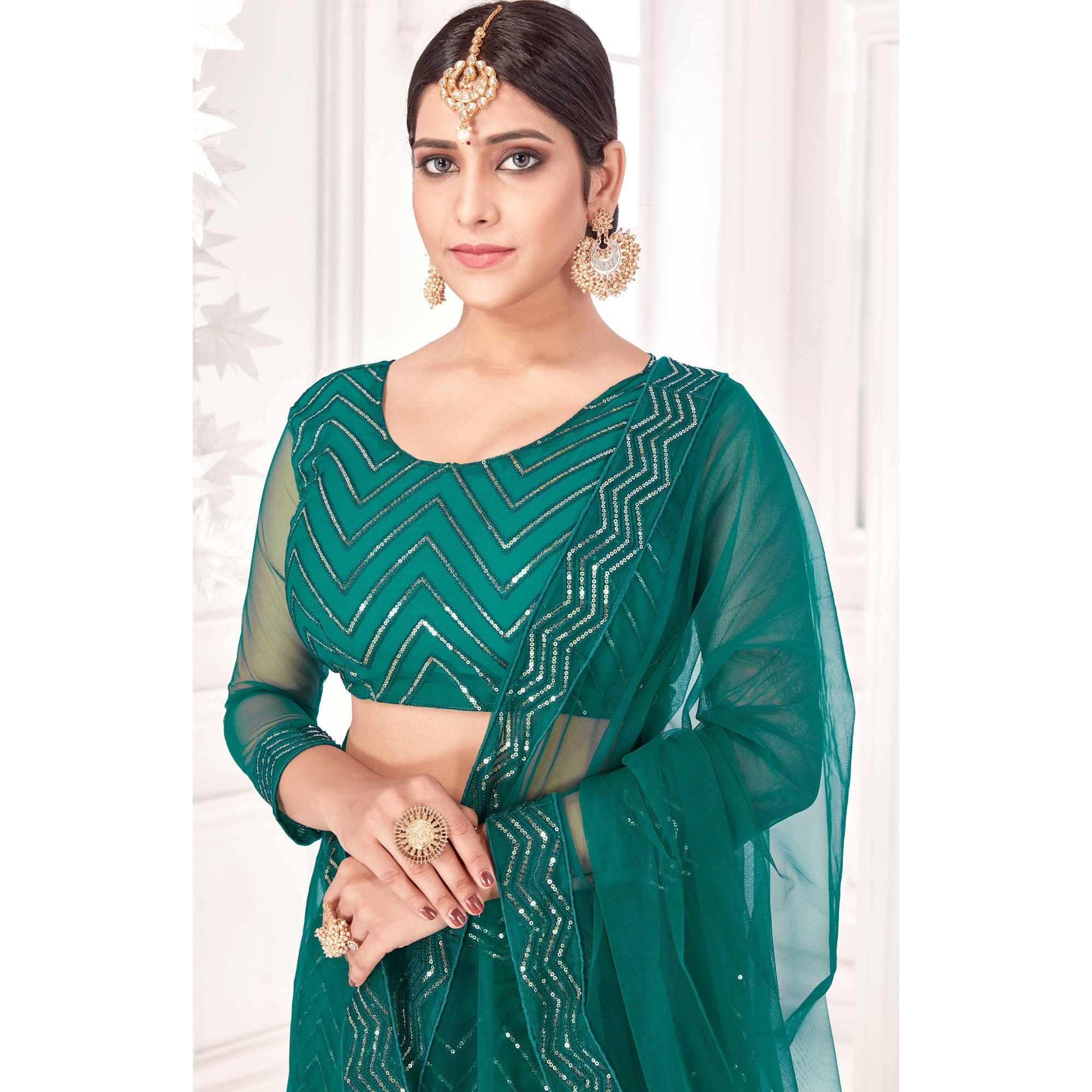 Rama Green Sequins Embroidered Netted Lehenga Choli