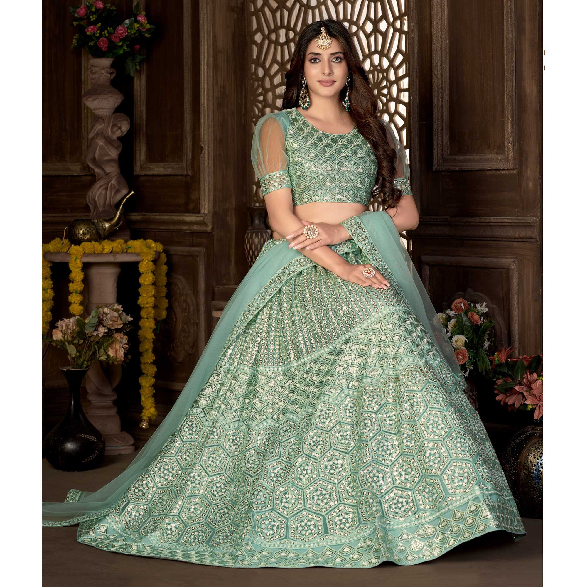 Sea Green Sequins Embroidered Netted Lehenga Choli